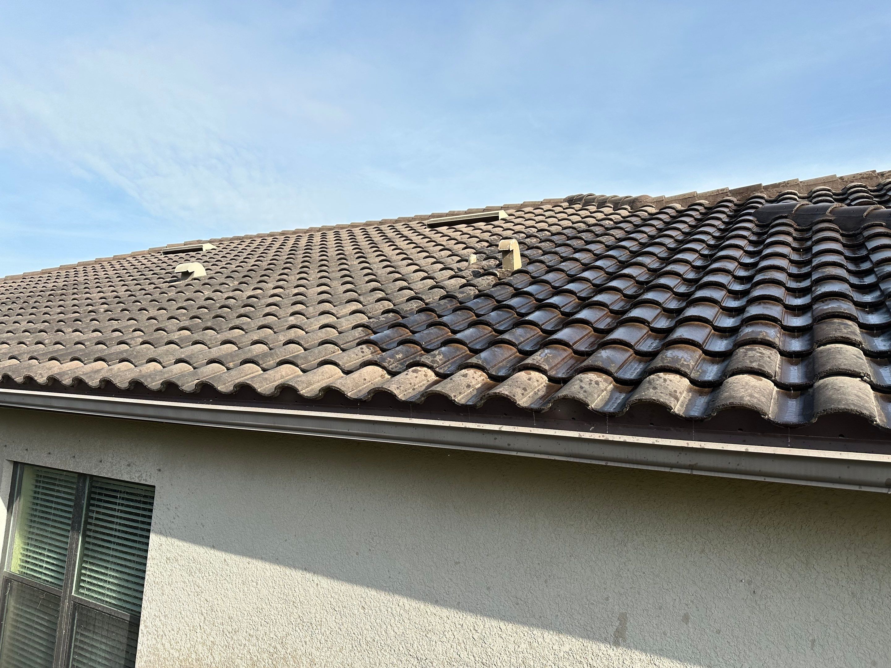 Concrete Tile Roof, Paver Pool Deck, Screen Enclosure & Driveway Cleaning in Artisan Lakes Esplanade, Palmetto, FL | Sunshine AquaWash by Sunshine AquaWash
