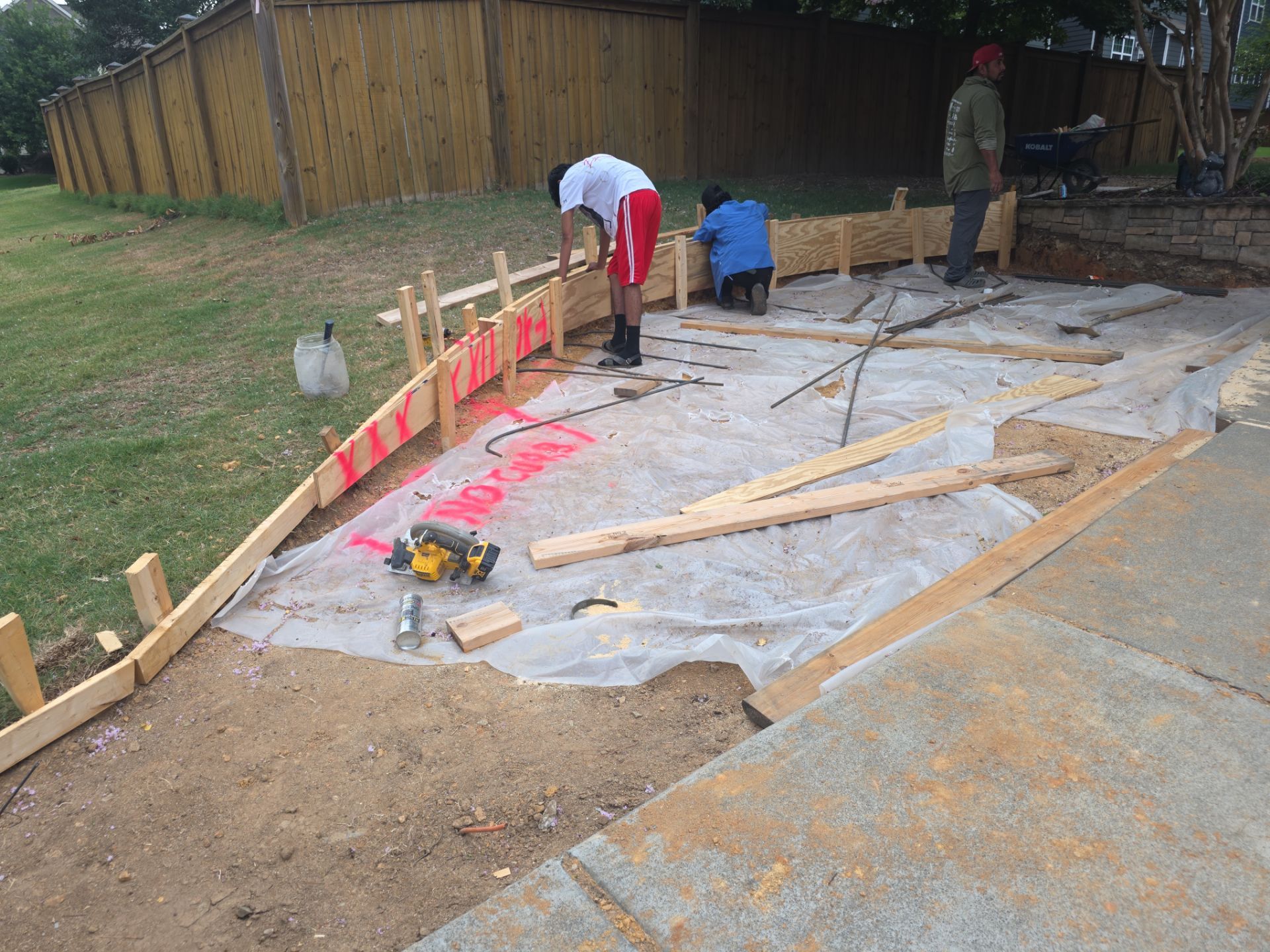 Concrete Driveway Expansion & Retaining Wall | Apex, NC by Elite Remodeling and Design LLC