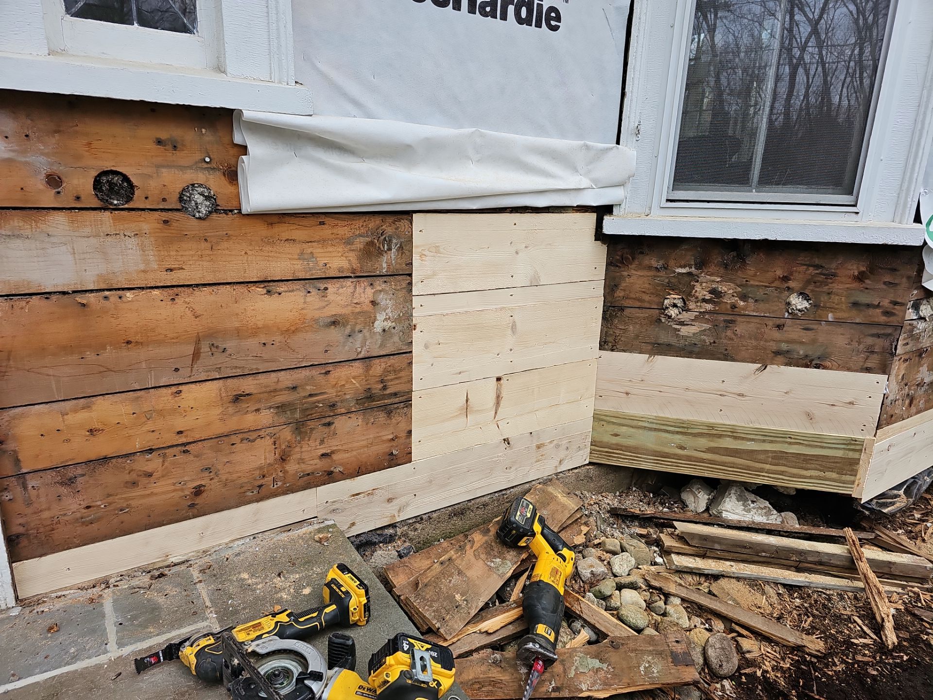 White cedar shingles and windows in Wayland, MA by UBrothers Construction