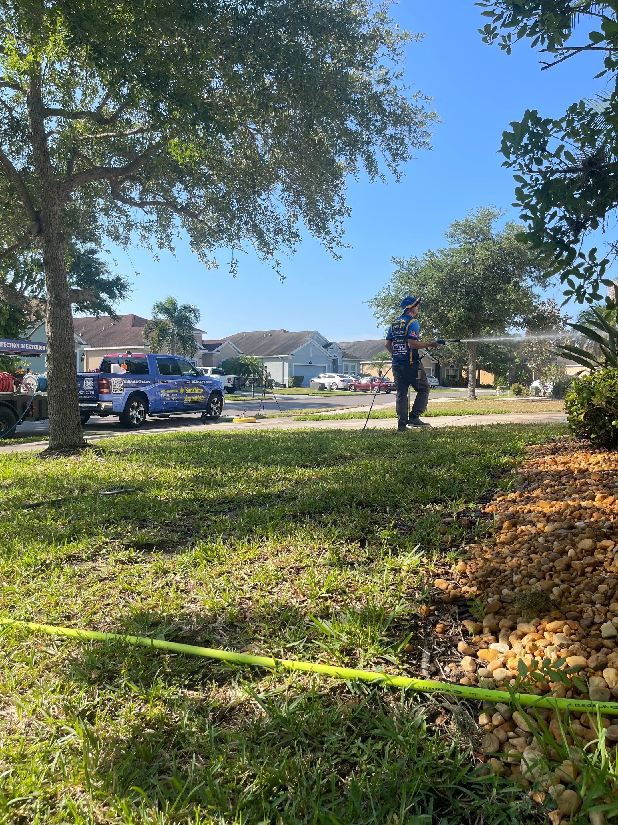 Asphalt Shingle Roof Soft Wash Cleaning & Concrete Pressure Washing in CopperStone Community, Parrish, FL by Sunshine AquaWash