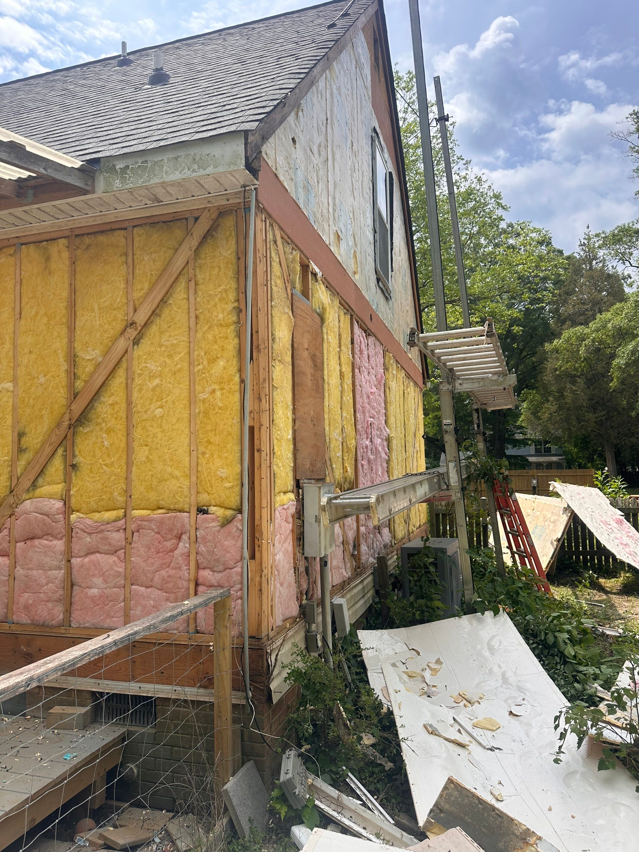 Gloucester Exterior Overhaul with Navy Blue Siding and New Roof by Cade Construction