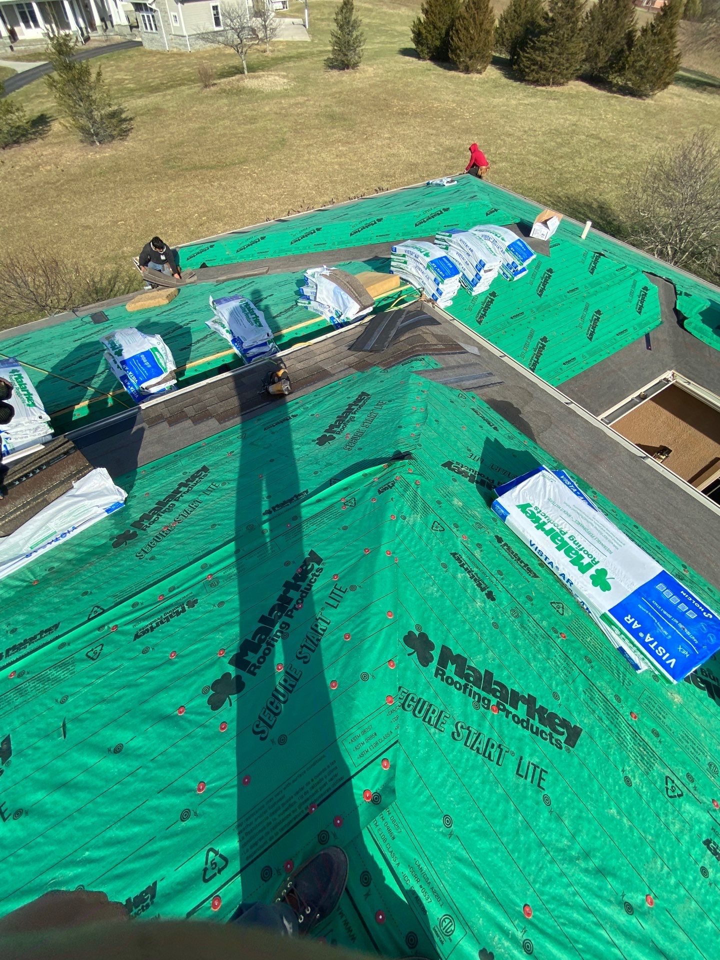 Residential Roofing Installation using Malarkey Vista AR Shingles (Weathered Wood Plus) by Koontz Construction
