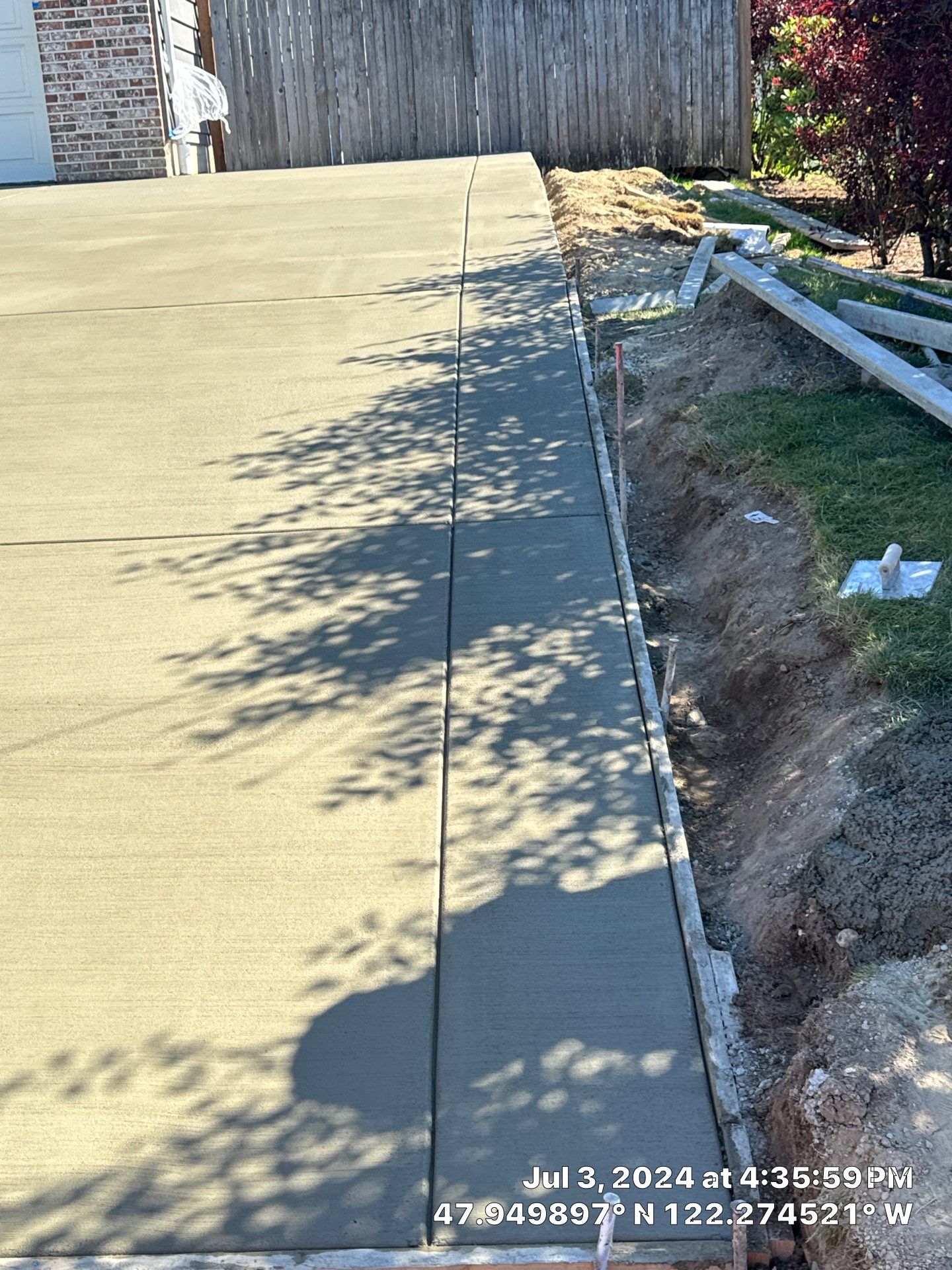 Jacob | Concrete Driveway  by Jireh Asphalt & Concrete Inc 