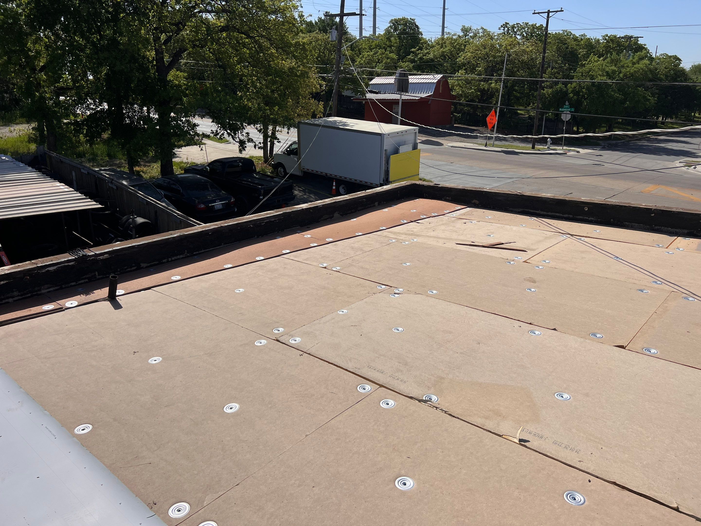 Holy Week and Holey deck install  by Becker Roofing and Exteriors