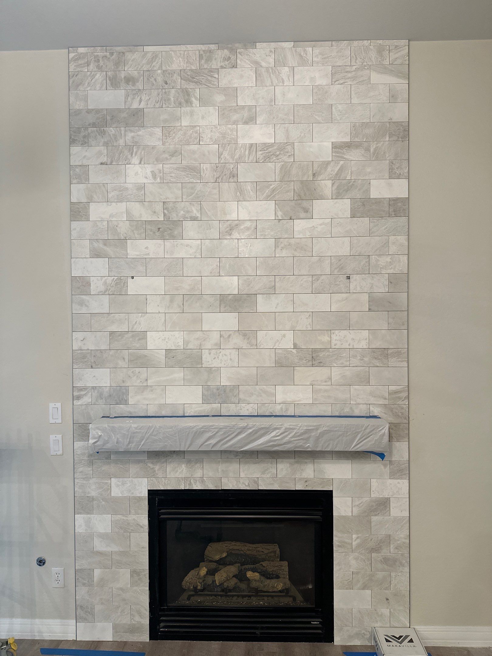 Marble Tile Fireplace by Footprints Floors of Chandler 