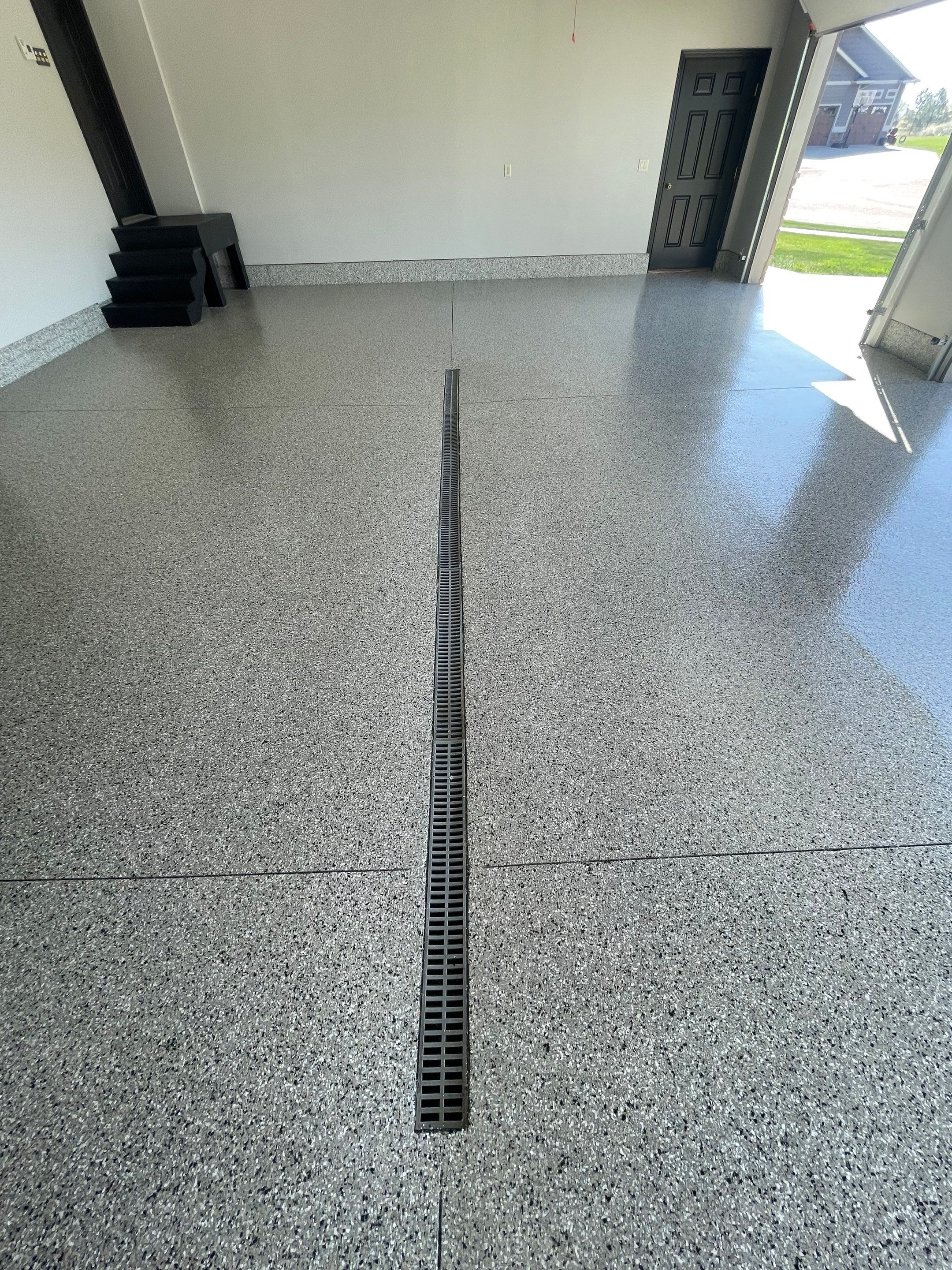 Multi-Car Garage Epoxy Floor Coating in Beresford by Select Painting, Coatings & Garage Cabinets