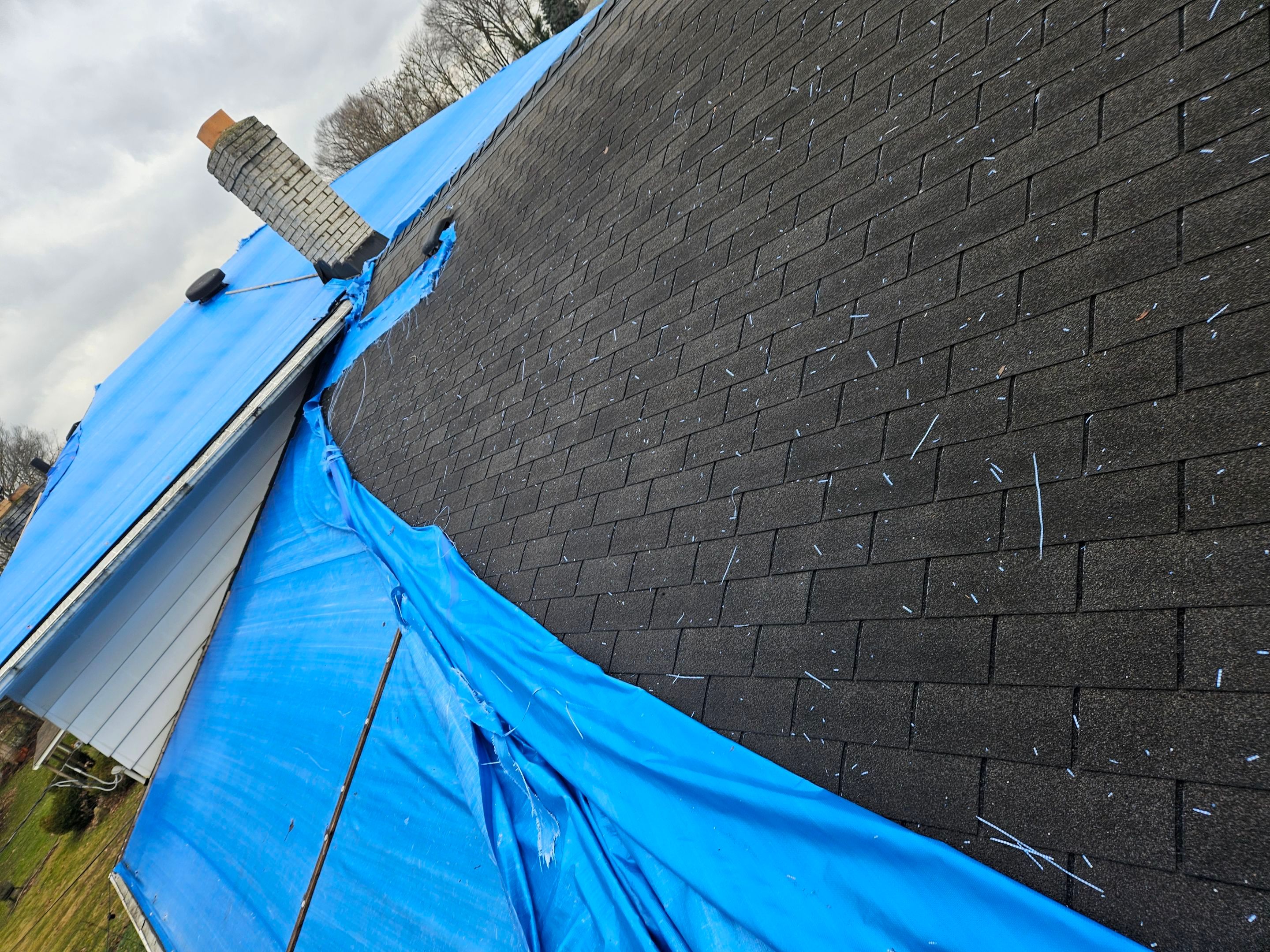 EMERGENCY TARPING ROOF BEFORE STORM using TARP by Absolute Roofing and Construction