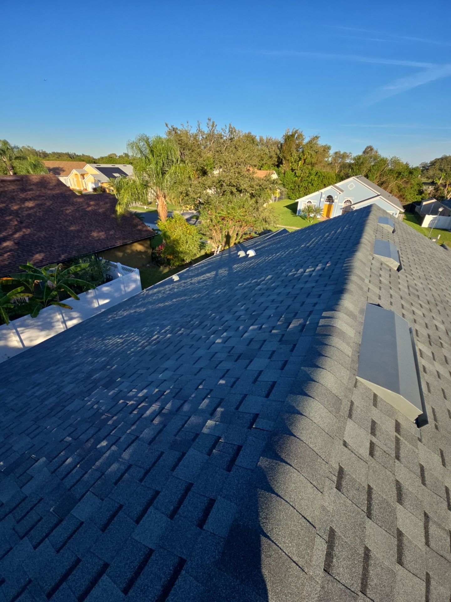 Atlas Pinnacle Pristine Architectural Shingle Roof Replacement in Kissimmee by Fortified Roofing Solutions Corp.