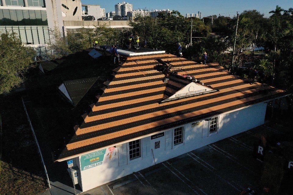 COMMERCIAL REROOF 24 GUAGE MEDIUM BRONZE 1-1/2" MECHANICAL SEAM "ZEBRA METHOD" by Earl W. Johnston Roofing 