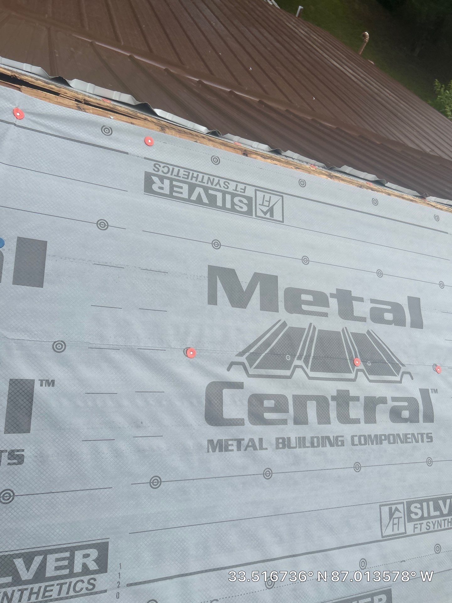 Metal Roof Replacement in Sylvan Springs (Brown) by The Roofing Dudes