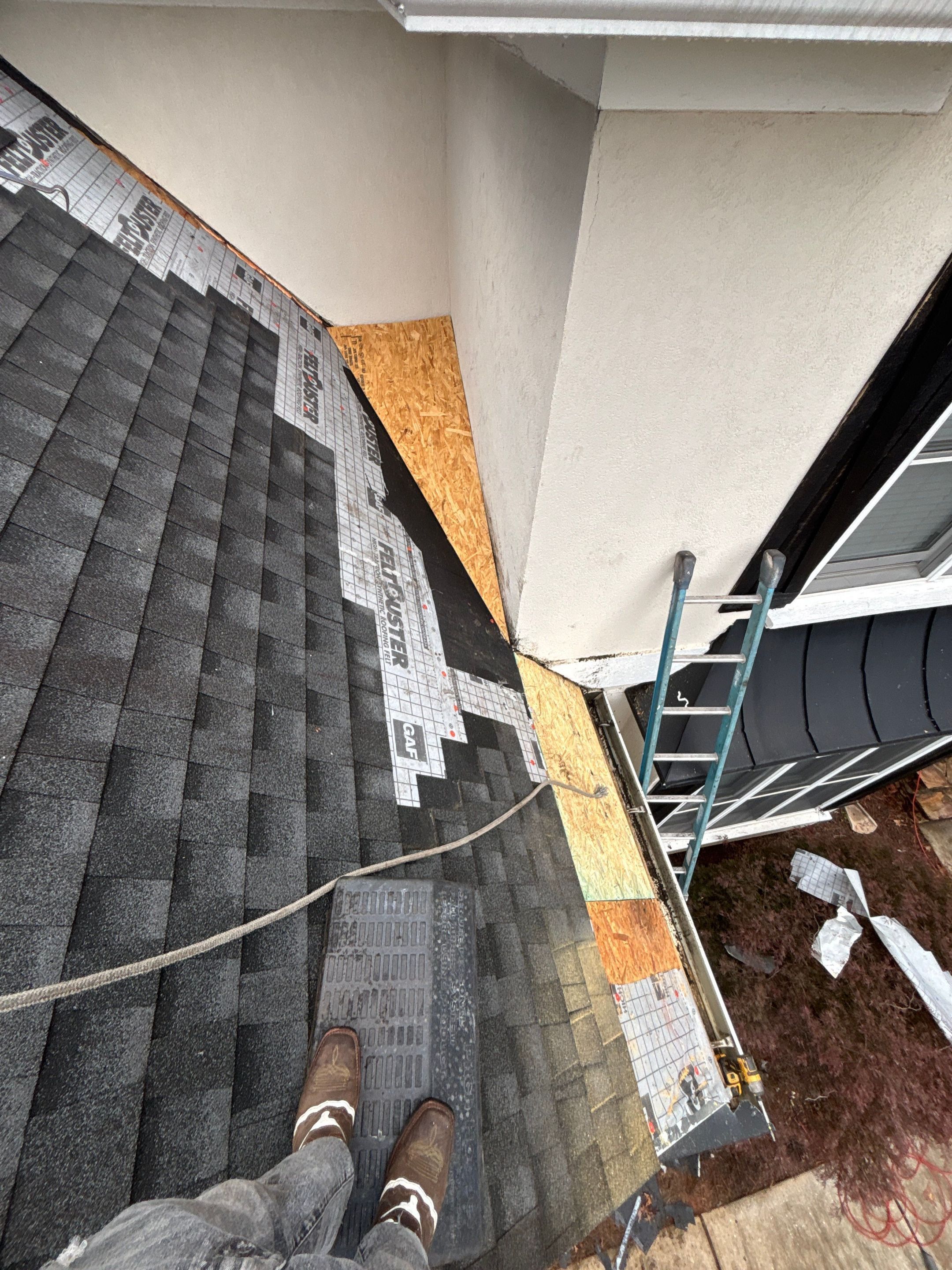 Wrong V valley section installed  by Deerfield Roofing LLC