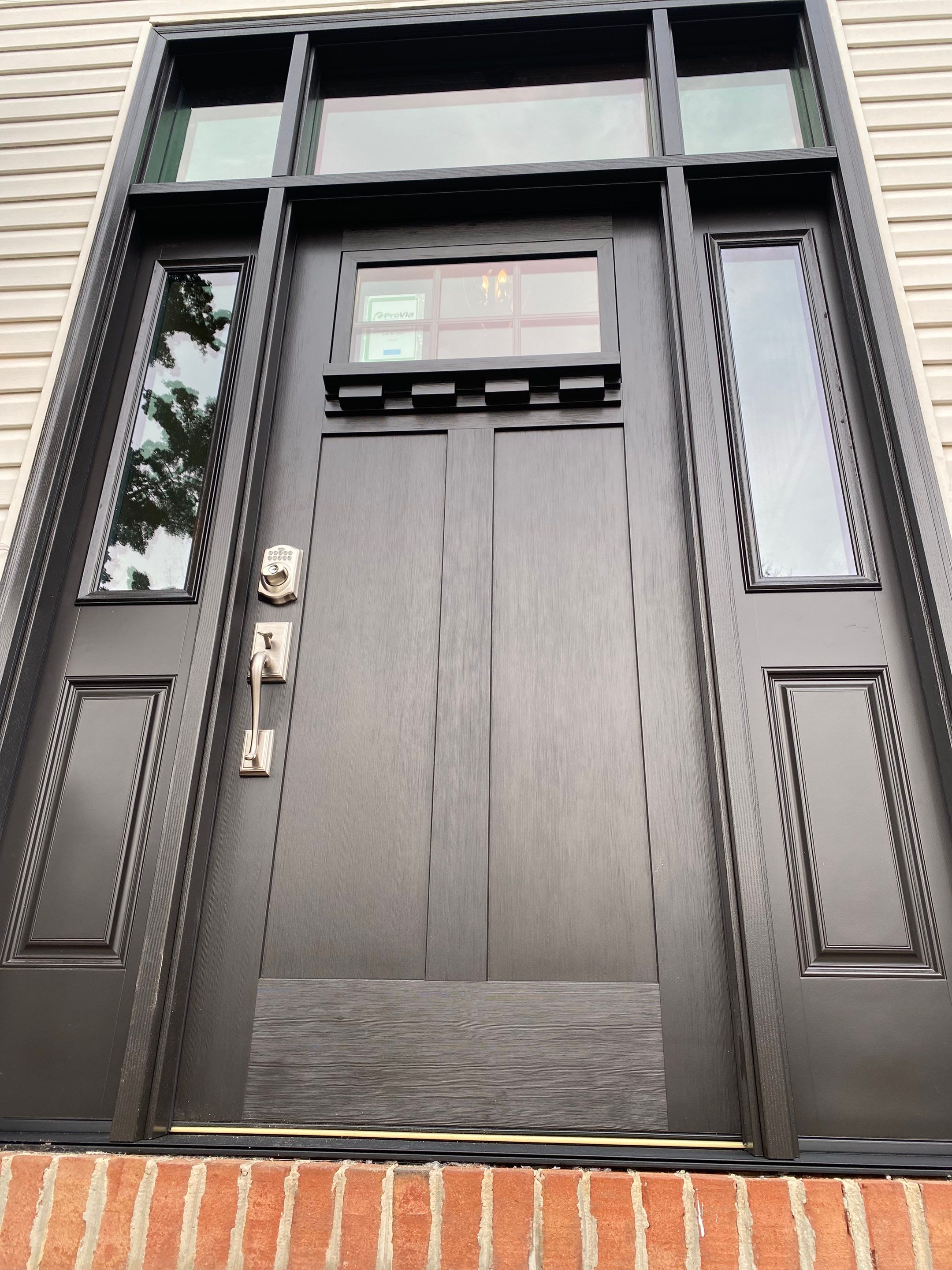 "🚪✨ Out with the old, in with the bold! Esh Builders just upgraded another customer's home to a custom Signet Entry Door by Provia MFG, blending style and durability right at your doorstep. #NewBeginnings #EshBuilders #HomeSweetHome 🏡💖" by Esh Builders