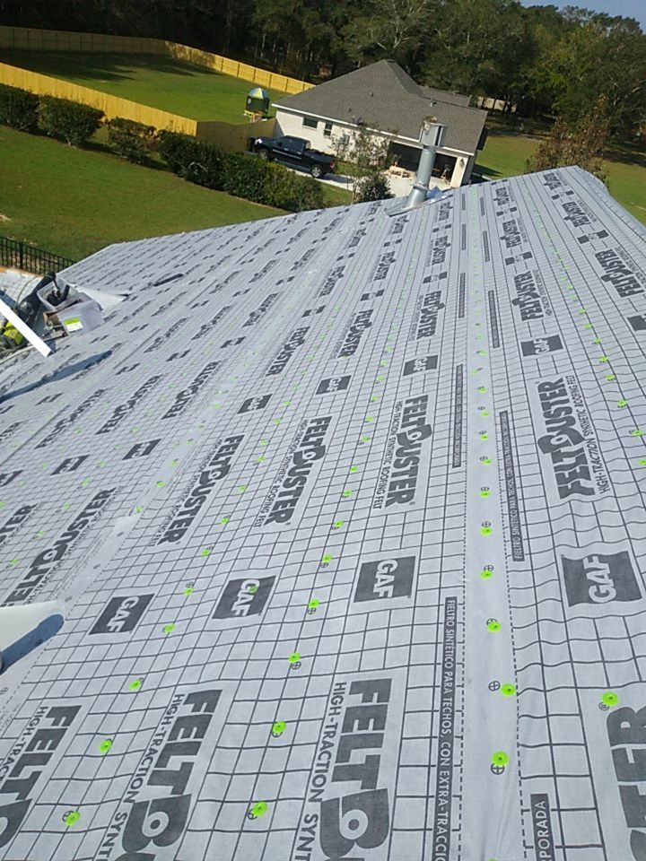 Residential Roofing Installation using Roof Replacement by American Roofing & Construction LLC