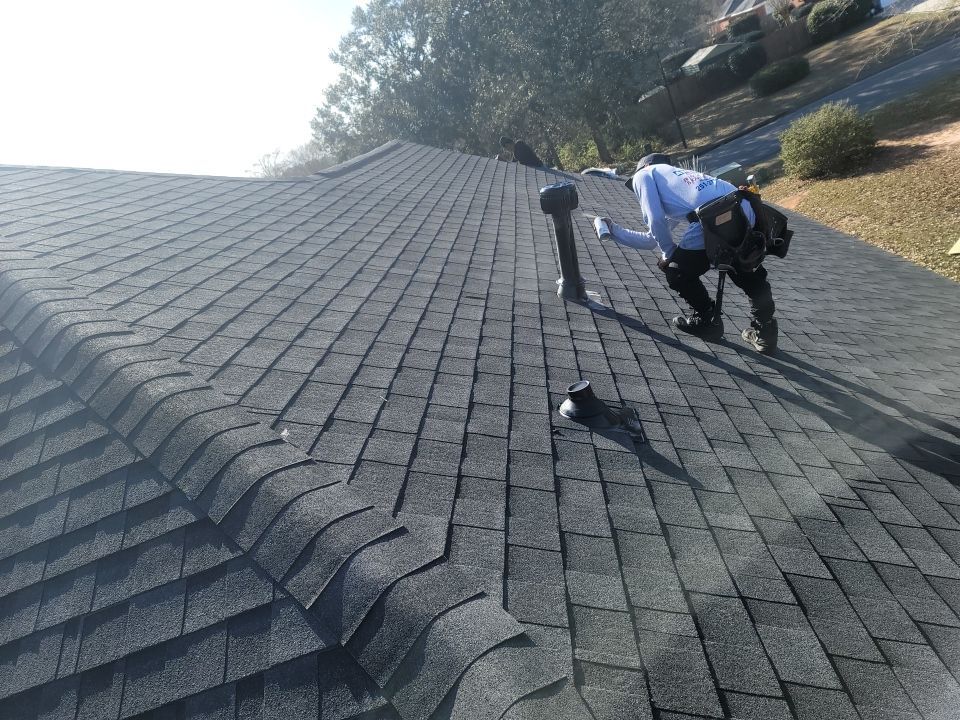 Residential Roofing Installation using Roof Replacement by American Roofing & Construction LLC