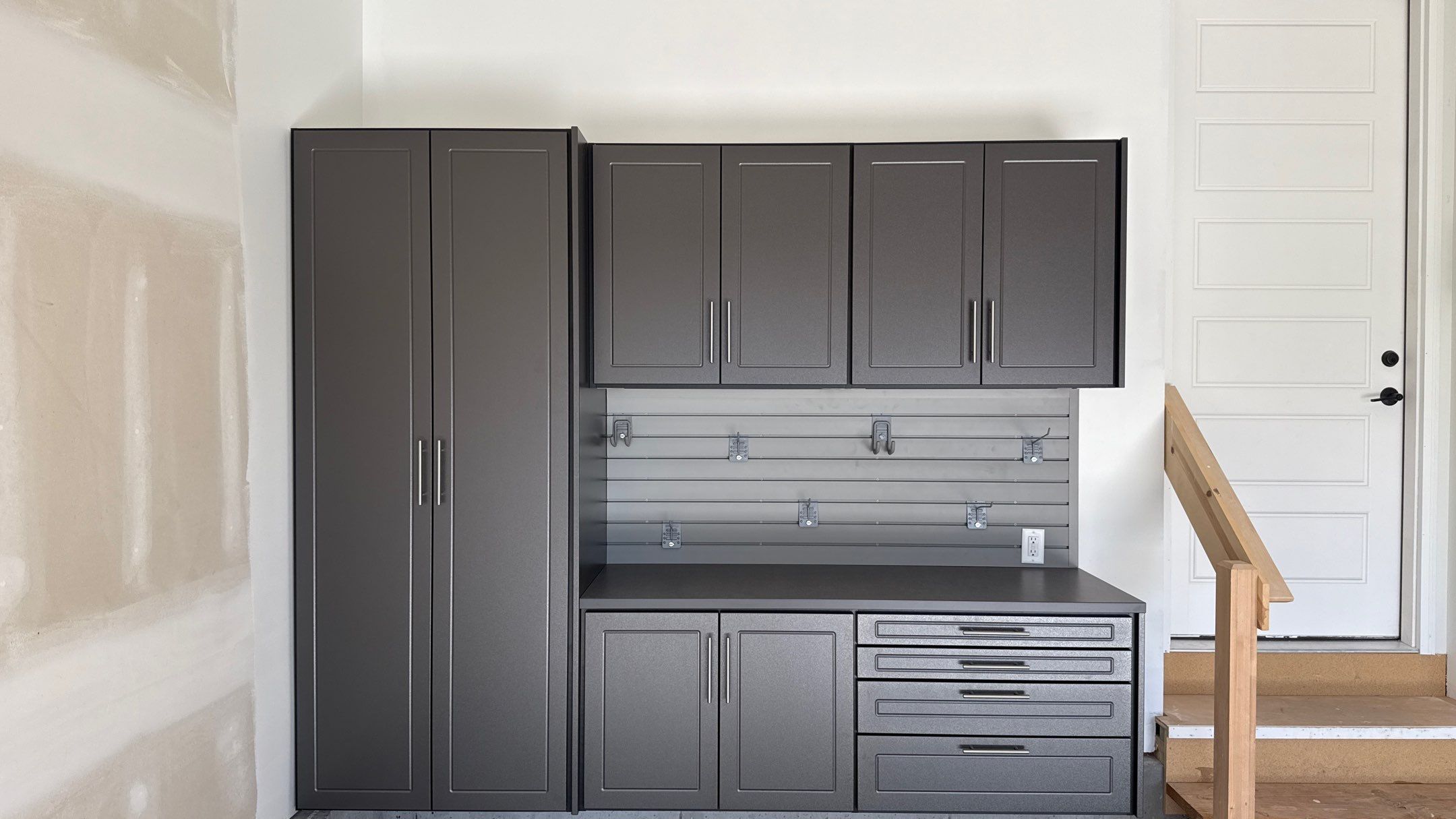 Nice Clean Look With These Pewter Cabinets by Banner Garage