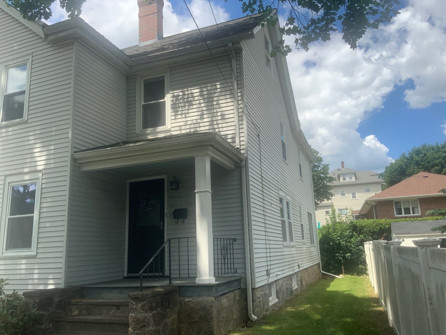 Vinyl siding layover project for 2 family in Wellesley, MA by UBrothers Construction
