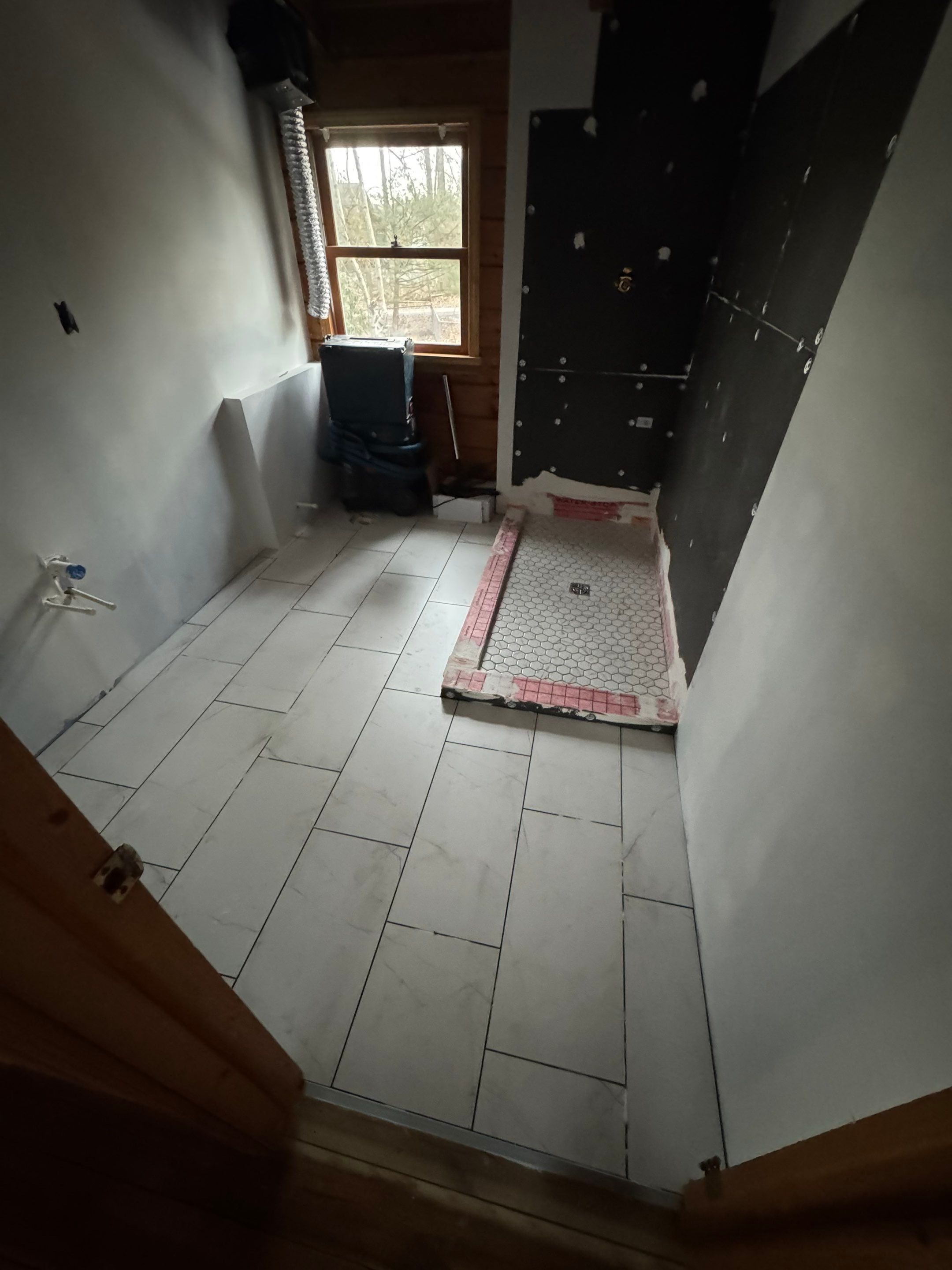 Brandt Double Bathroom Remodel by Integrity Tile and Home LLC