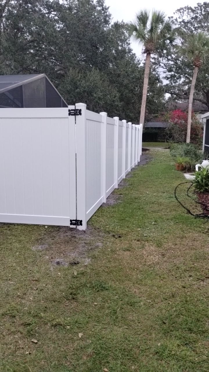 White Vinyl Privacy Fence Installation In North Port, FL by Asap fence and gates, LLC