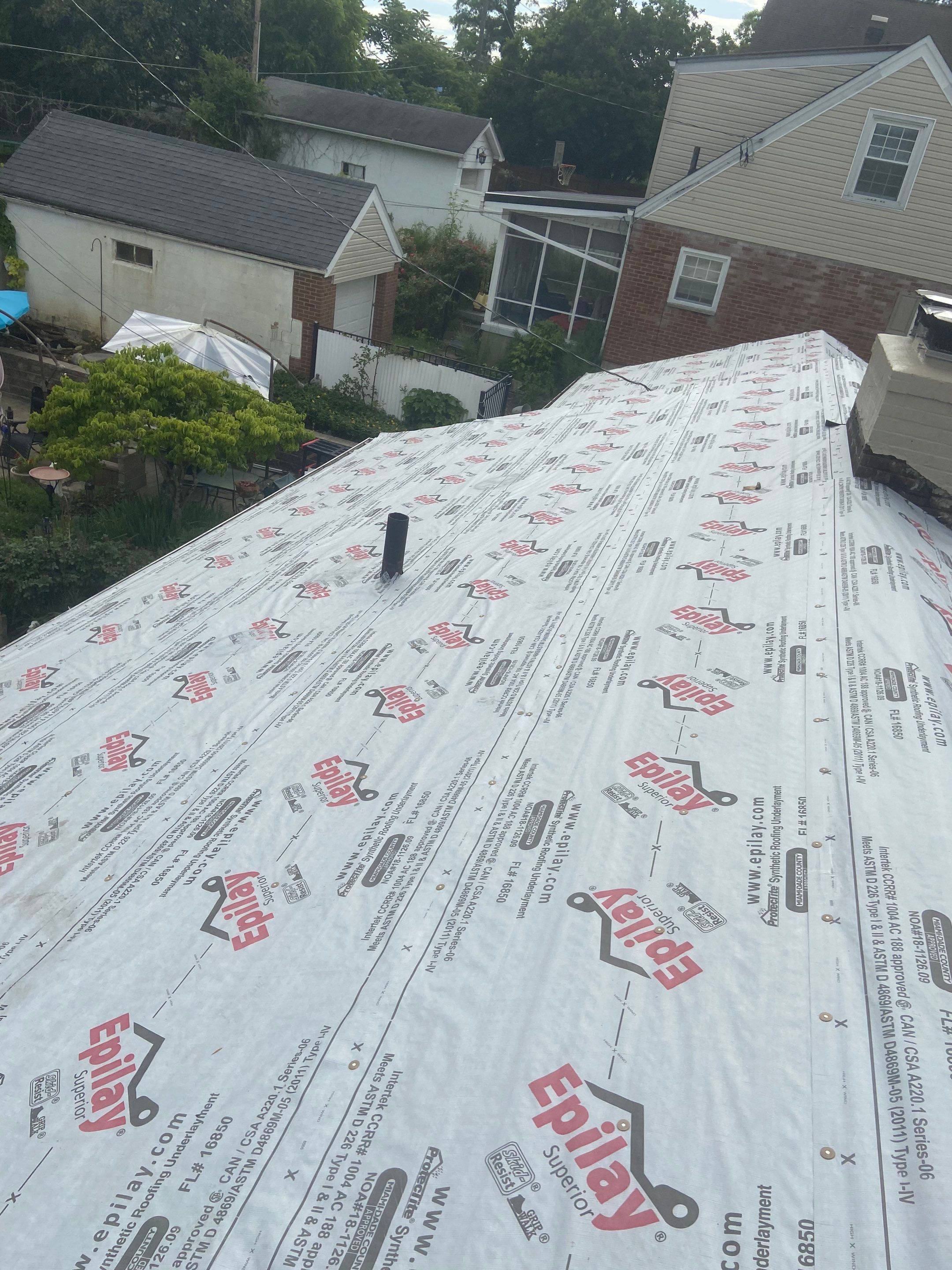 Metal Roofing, Skylights, Porch Build by Secure Construction Company Inc