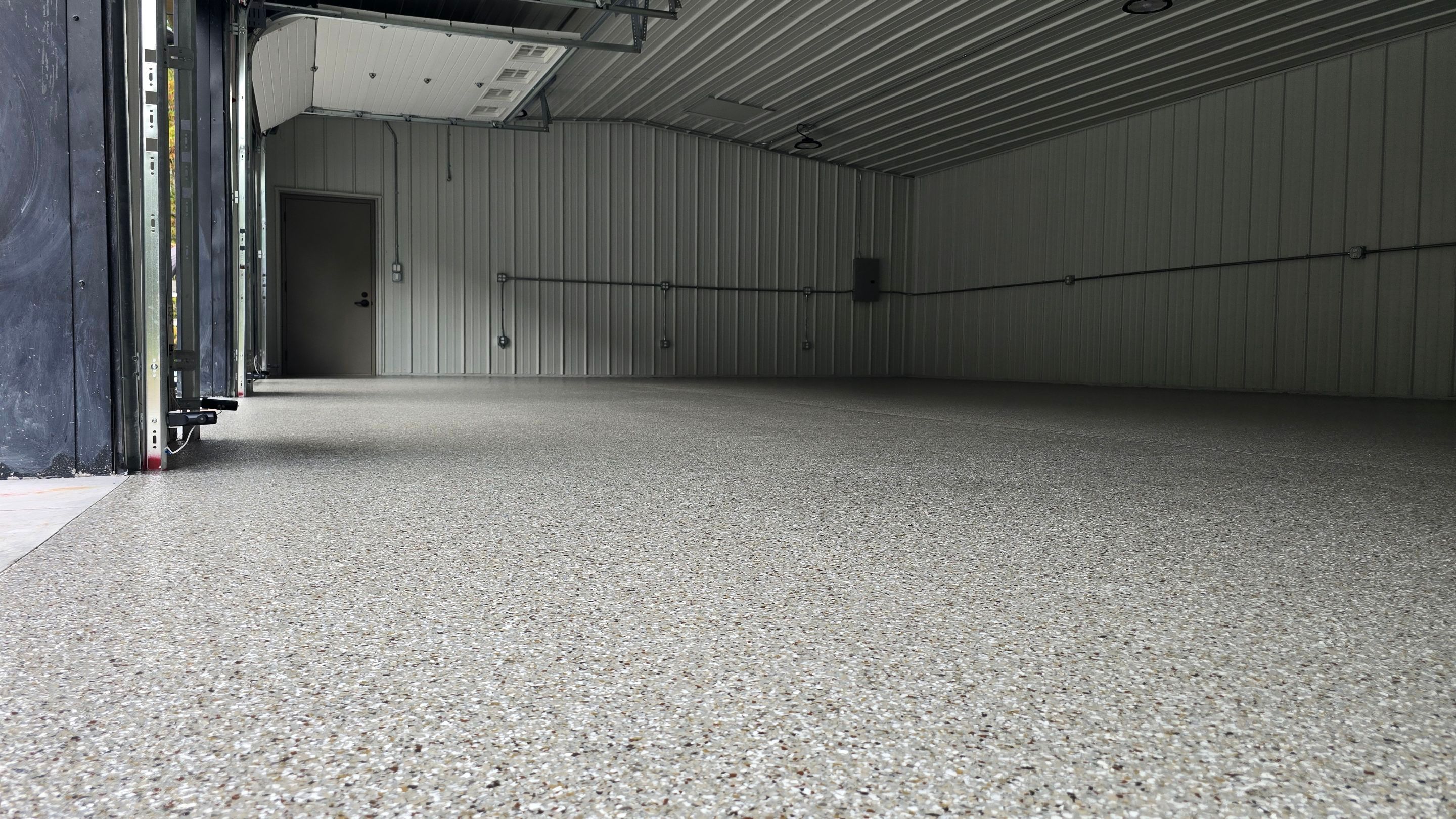 Garage using Creekbed by Elite Floor Solutions