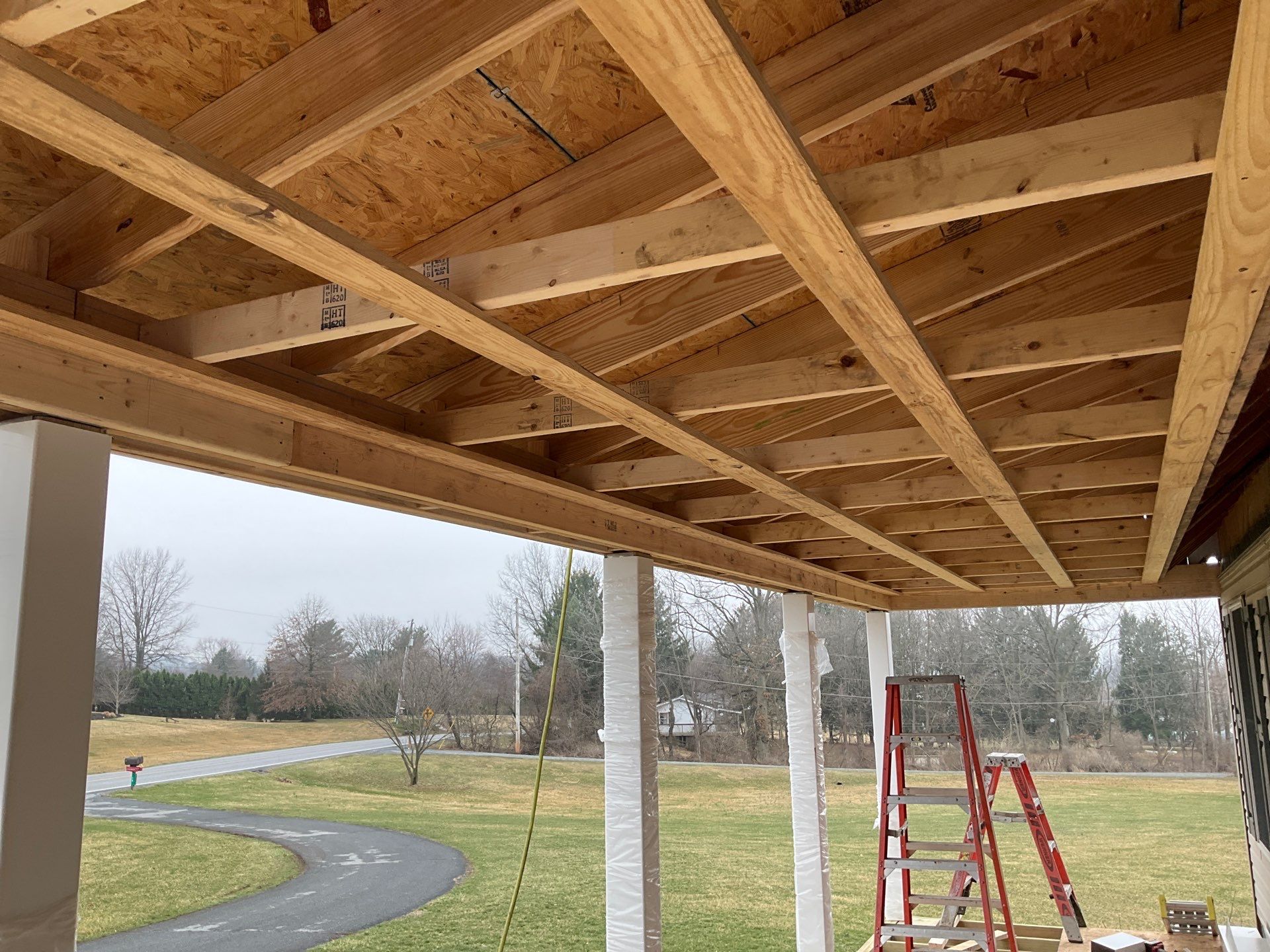 Custom Porch Roof Addition and Siding Renovation in Myerstown, PA by Esh Builders