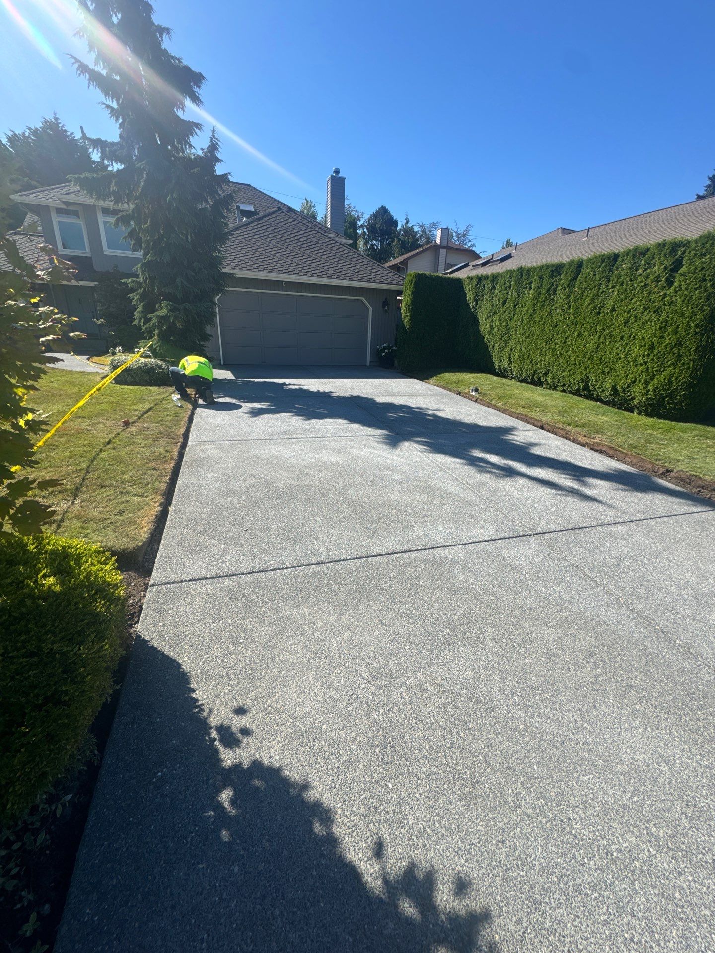 Exposed Aggregate Concrete Driveway Makeover  by Jireh Asphalt & Concrete Inc 