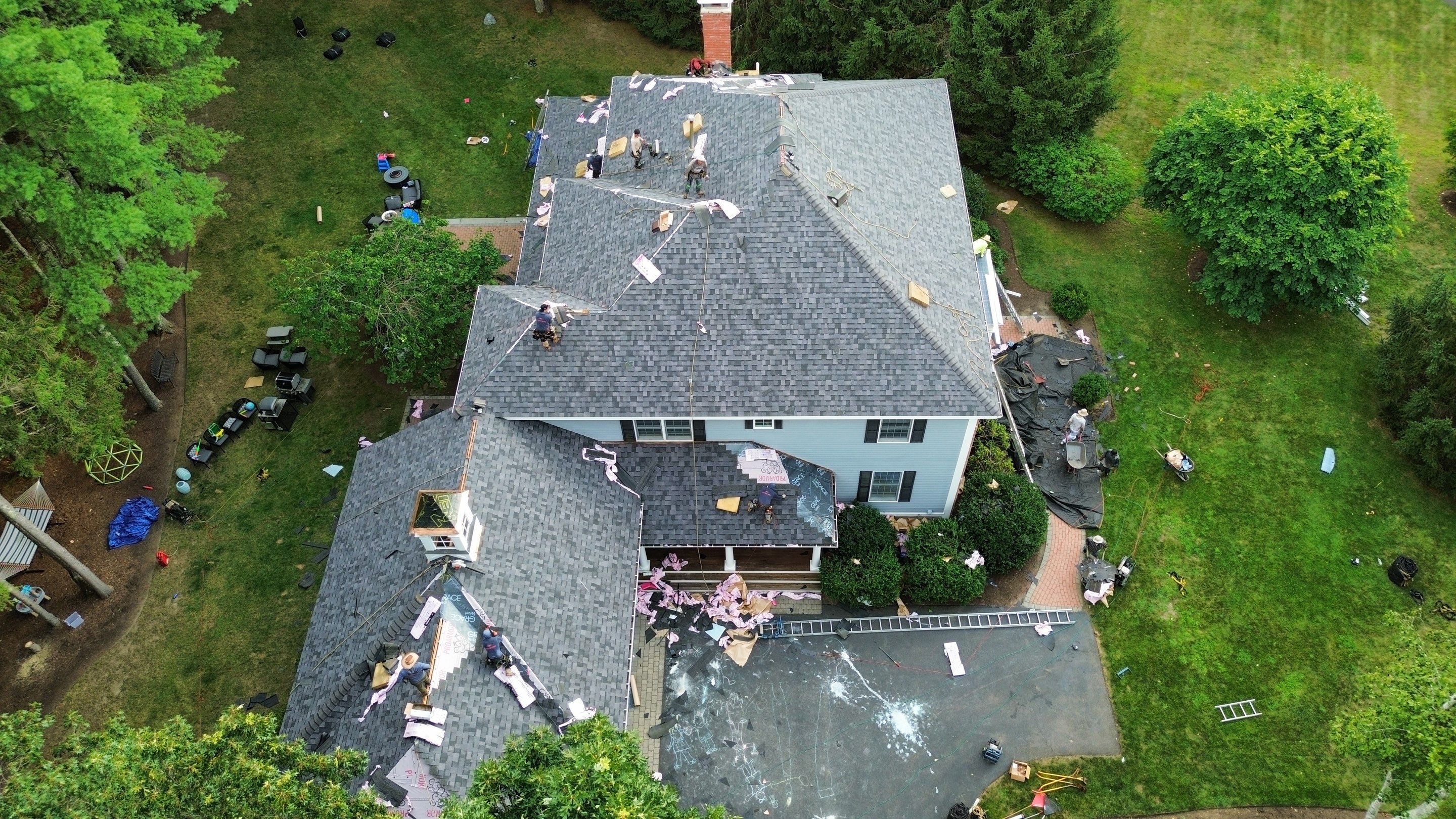 Roof Replacement & Gutter System Upgrade in Westford, MA by Mighty Dog Roofing of Greater Middlesex County