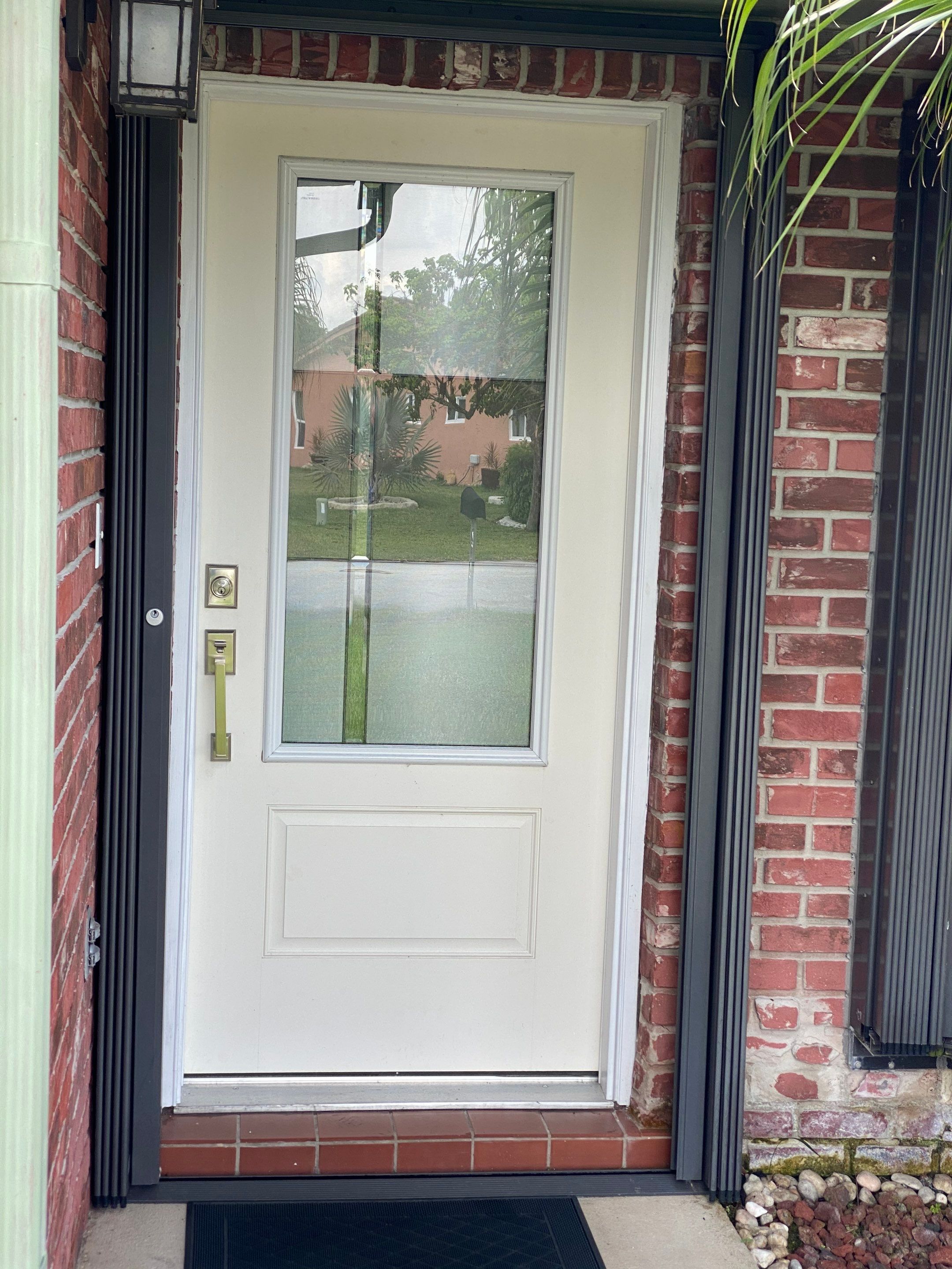 Fiberglass Impact Entry Door Installation – Tamarac, FL by The Door Doctor of South Florida, Inc.