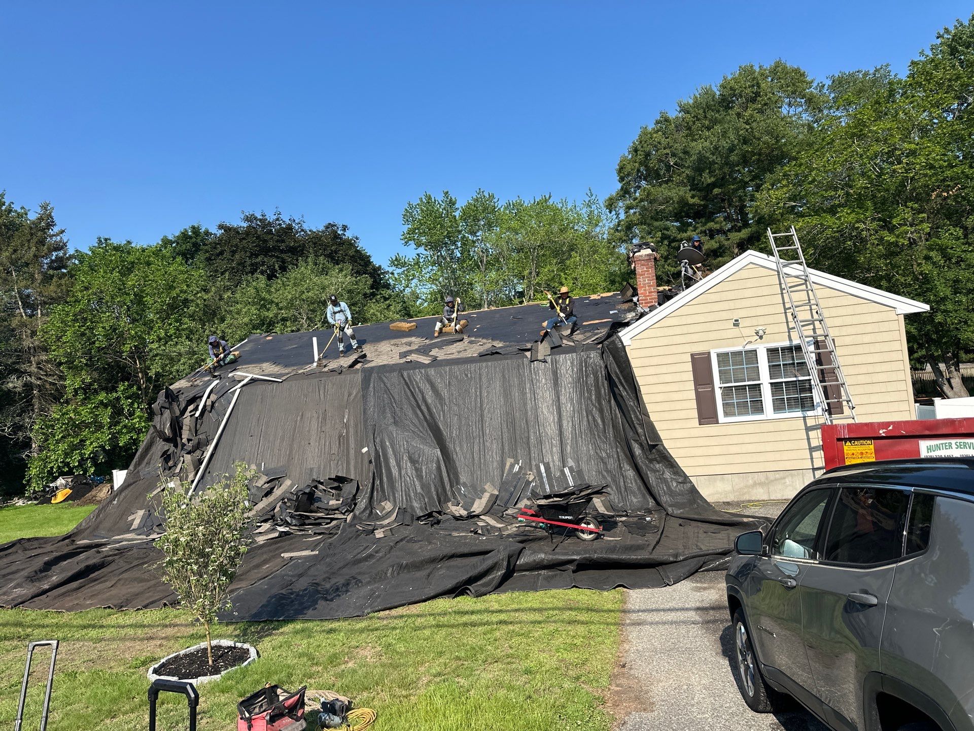 Full Roof Replacement & Chimney Repair – Onyx Black, MA by Mighty Dog Roofing of Greater Middlesex County
