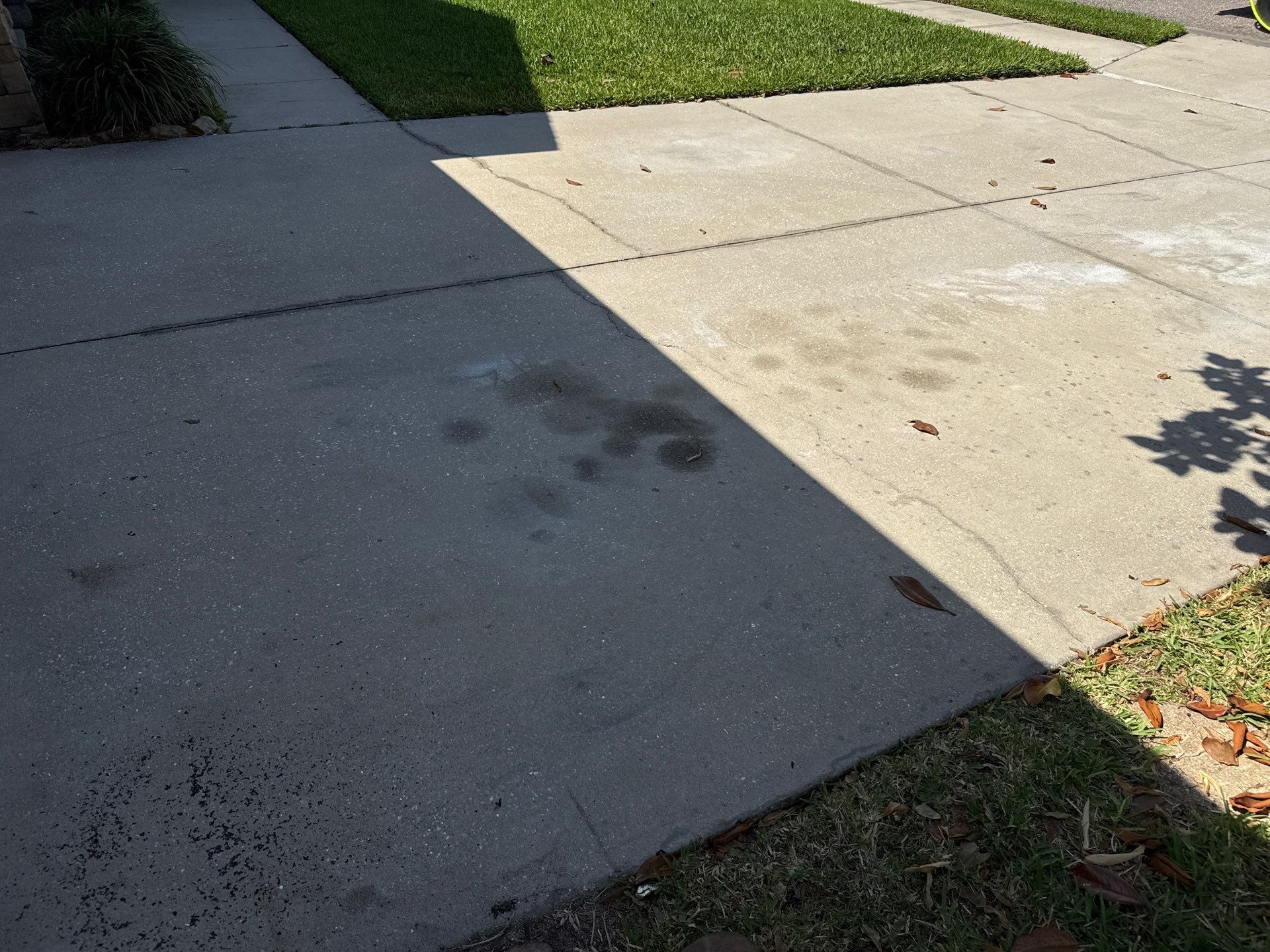 Concrete Driveway Oil Stain Removal | Harrison Ranch Community | Parrish, FL by Sunshine AquaWash
