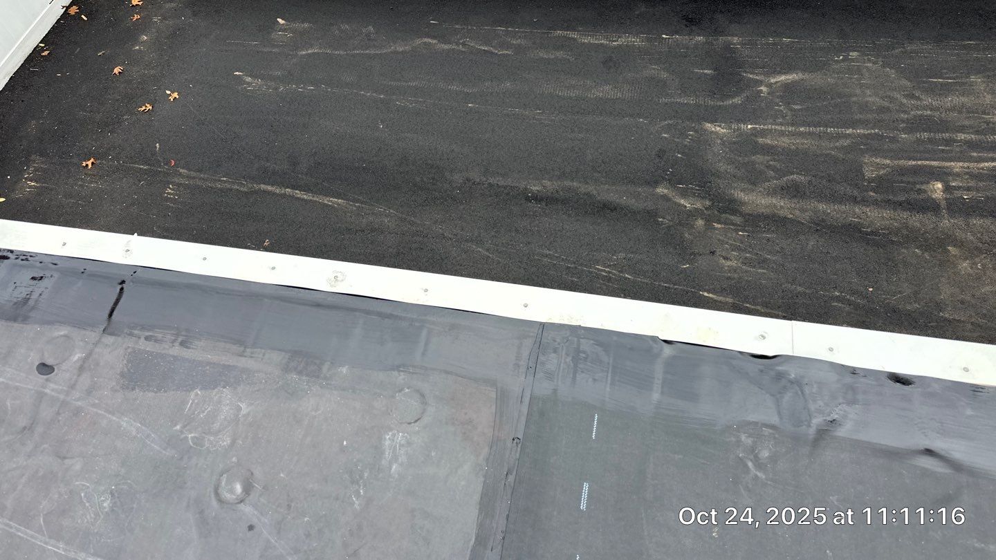 Westford EPDM Flat Roof with Gutter & Soffit/Fascia Replacement by Mighty Dog Roofing of Greater Middlesex County
