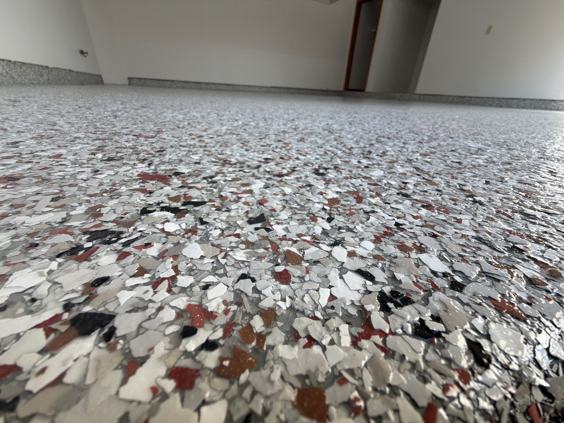 Custom Epoxy Flake Floor Coating and Ceiling Repair in Muskegon by Gordon Painting