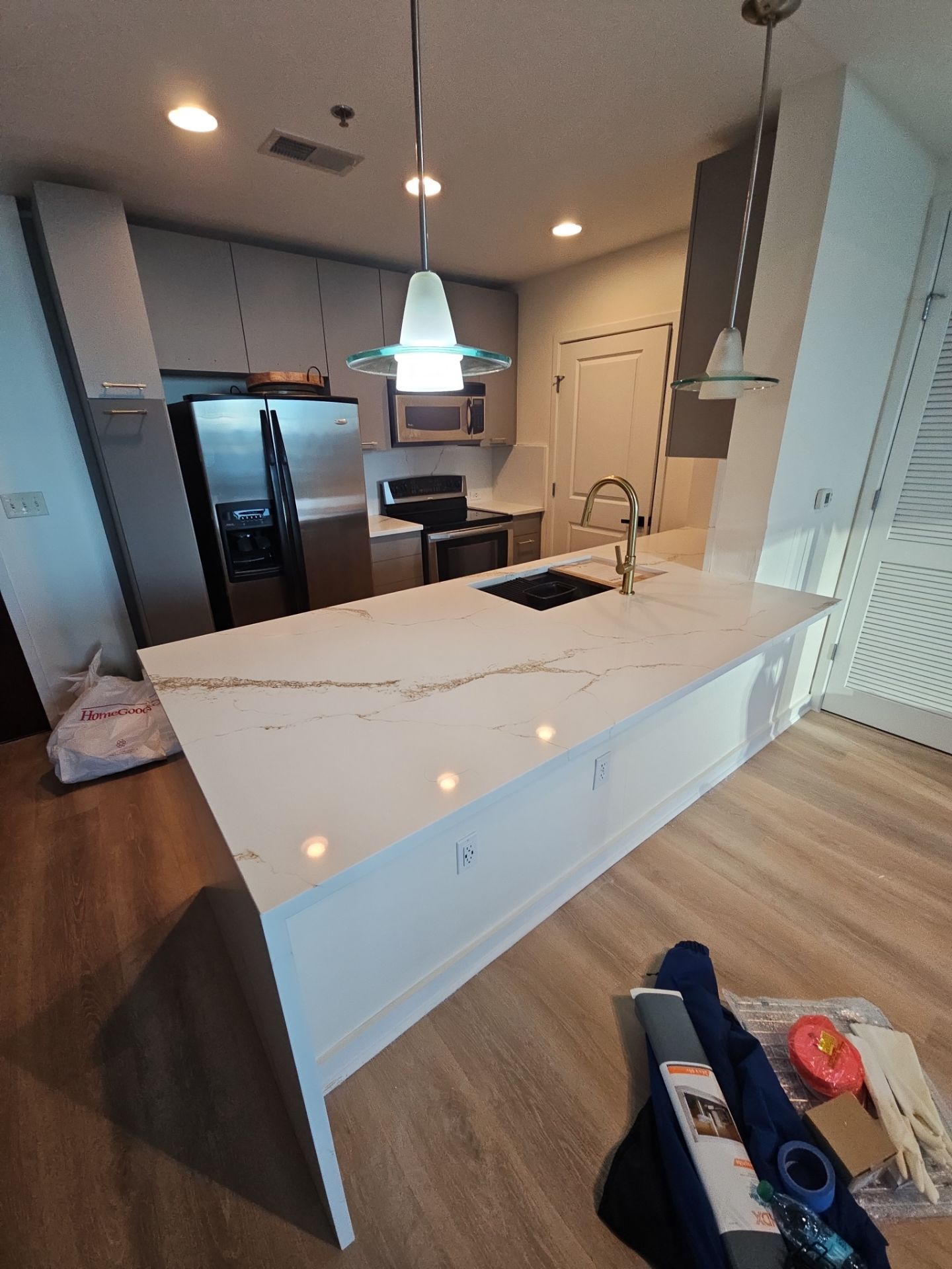 Dry Bar and Kitchen Countertop Conversion by Ajayi Design and Construction 