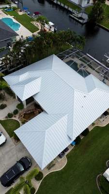 Residential Roofing Installation using Standing Seam Metal