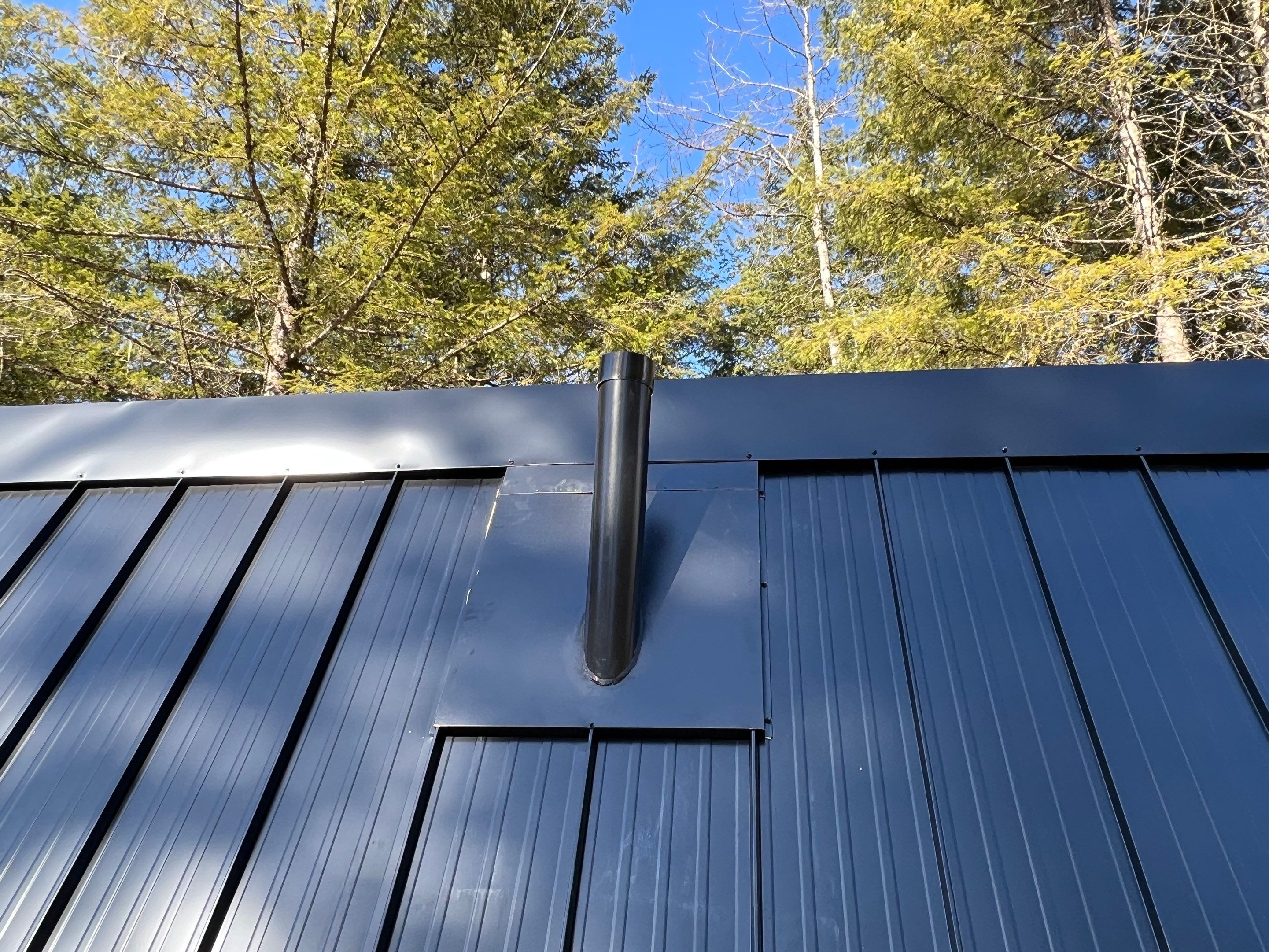 Residential Roofing Installation using 12" Prolok metal  by Top Notch Roofing Inc