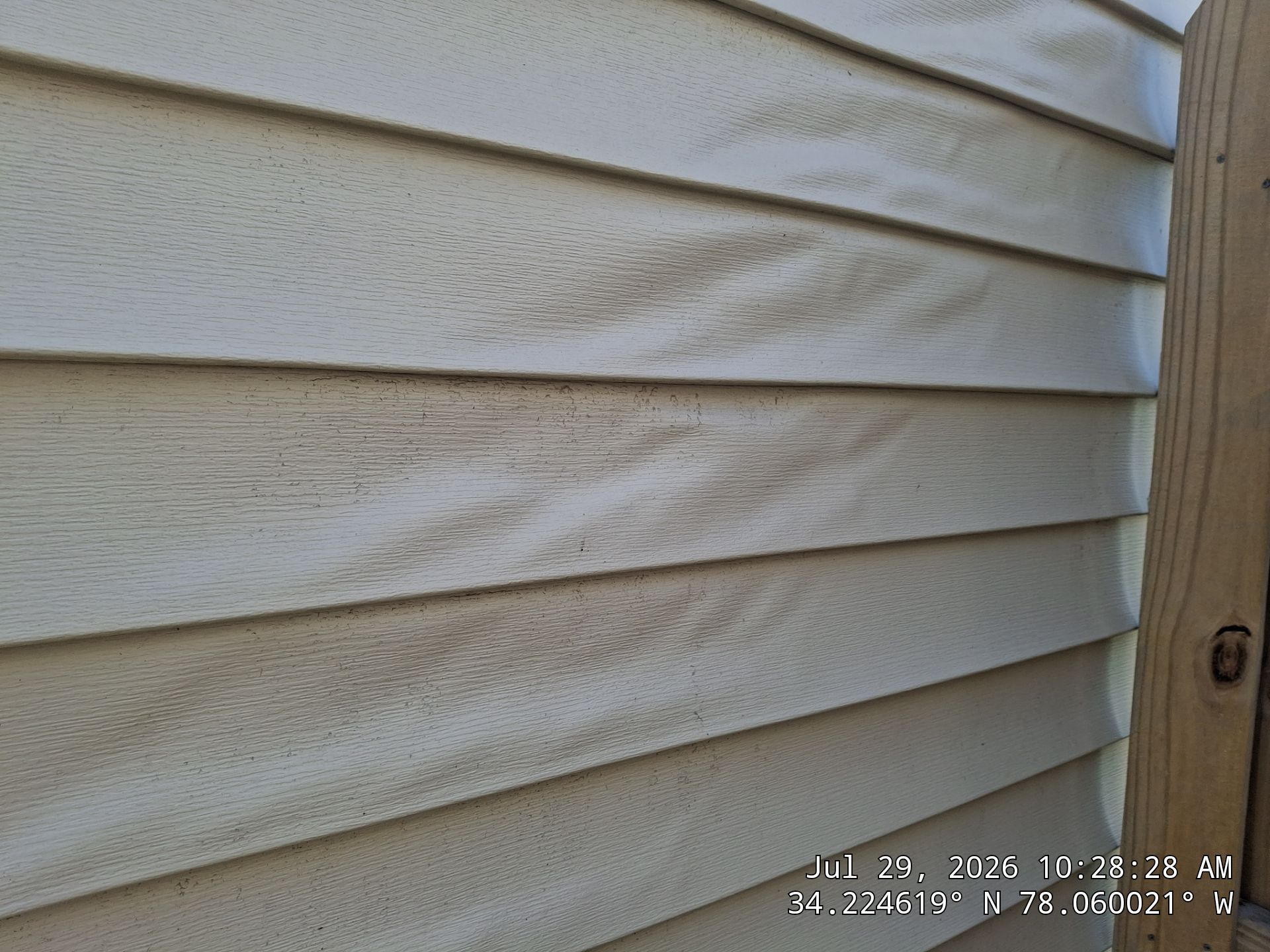Warped Vinyl Siding Replacement in Leland, NC by RGR Construction and Roofing, LLC