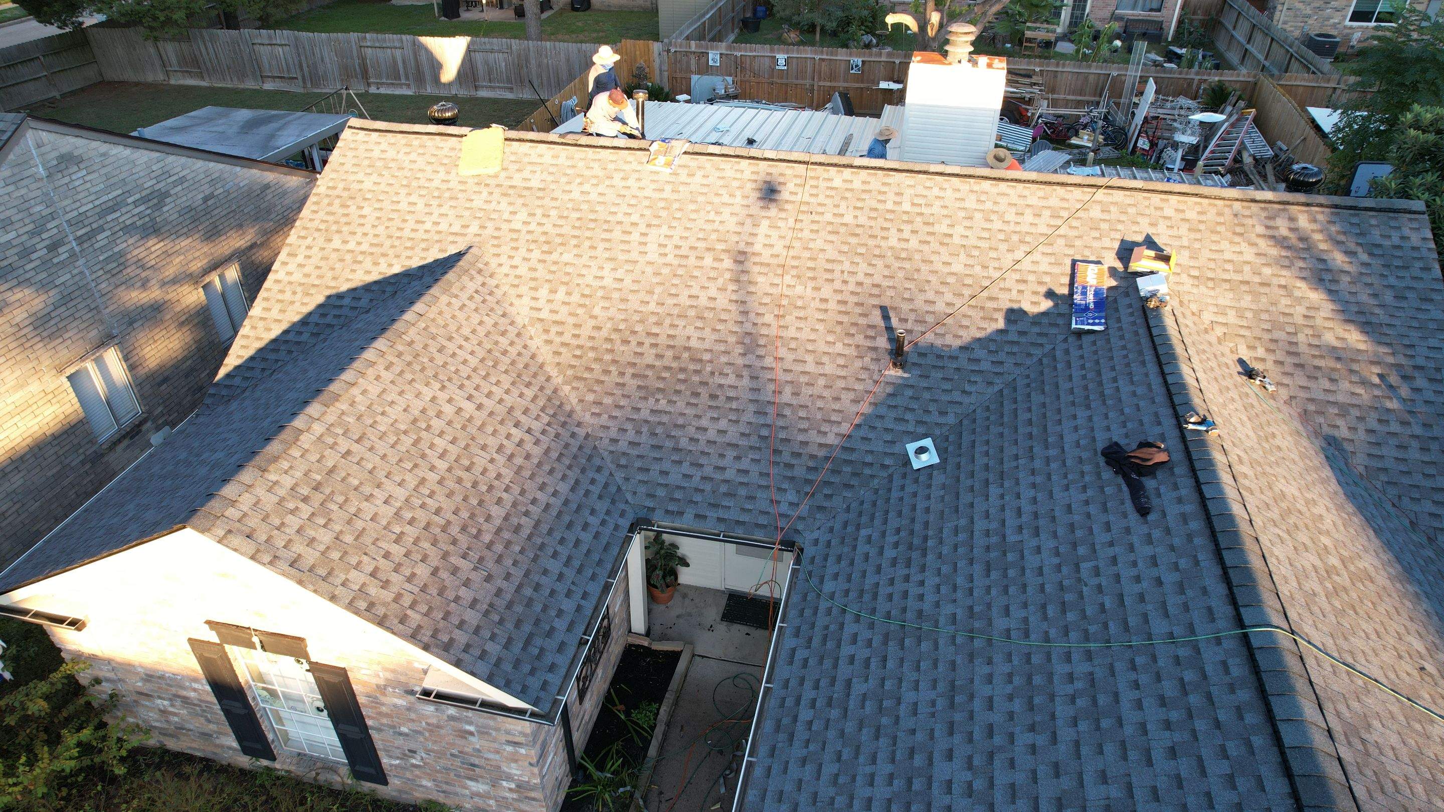 Tan Architectural Shingle Roof Replacement — Houston, TX by PL Roofing & SB Roofing, LLC.