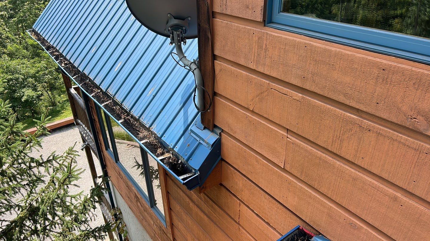 Residential Roofing Installation using Standing Seam Metal - Gallery Blue by RoofX 