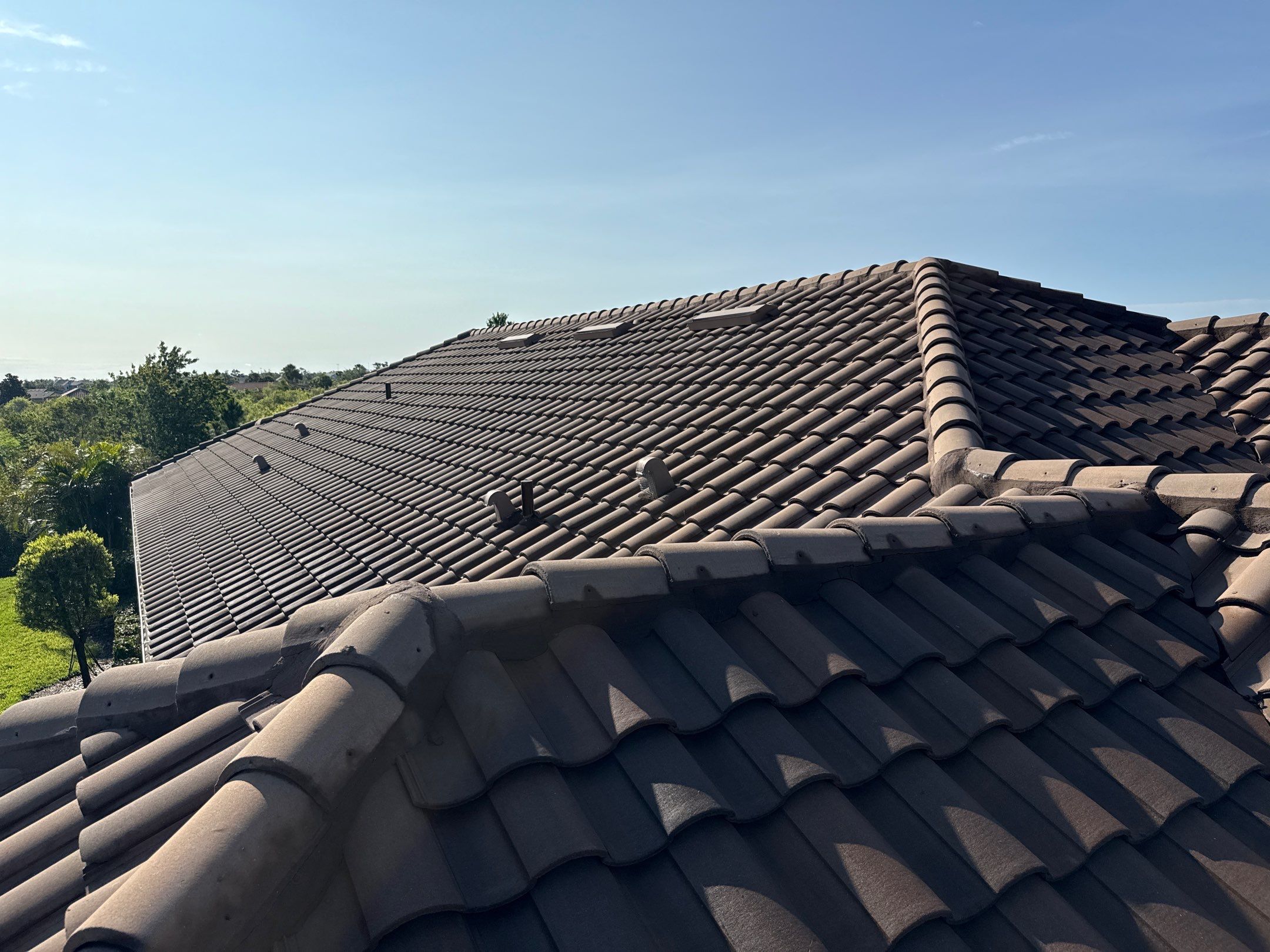 Concrete Tile Roof, Paver Driveway & Lanai Cleaning – Artisan Lakes Esplanade, Palmetto, FL by Sunshine AquaWash