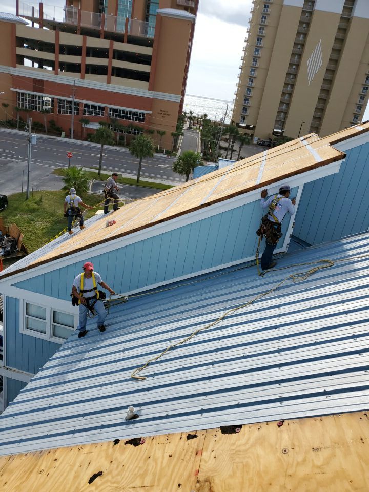 Commercial Roofing Installation using Metal roofing by American Roofing & Construction LLC