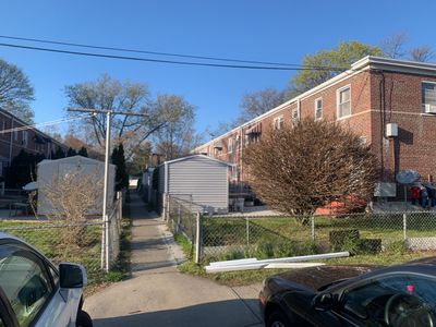 Commercial Roofing Installation using EPDM with white gutters