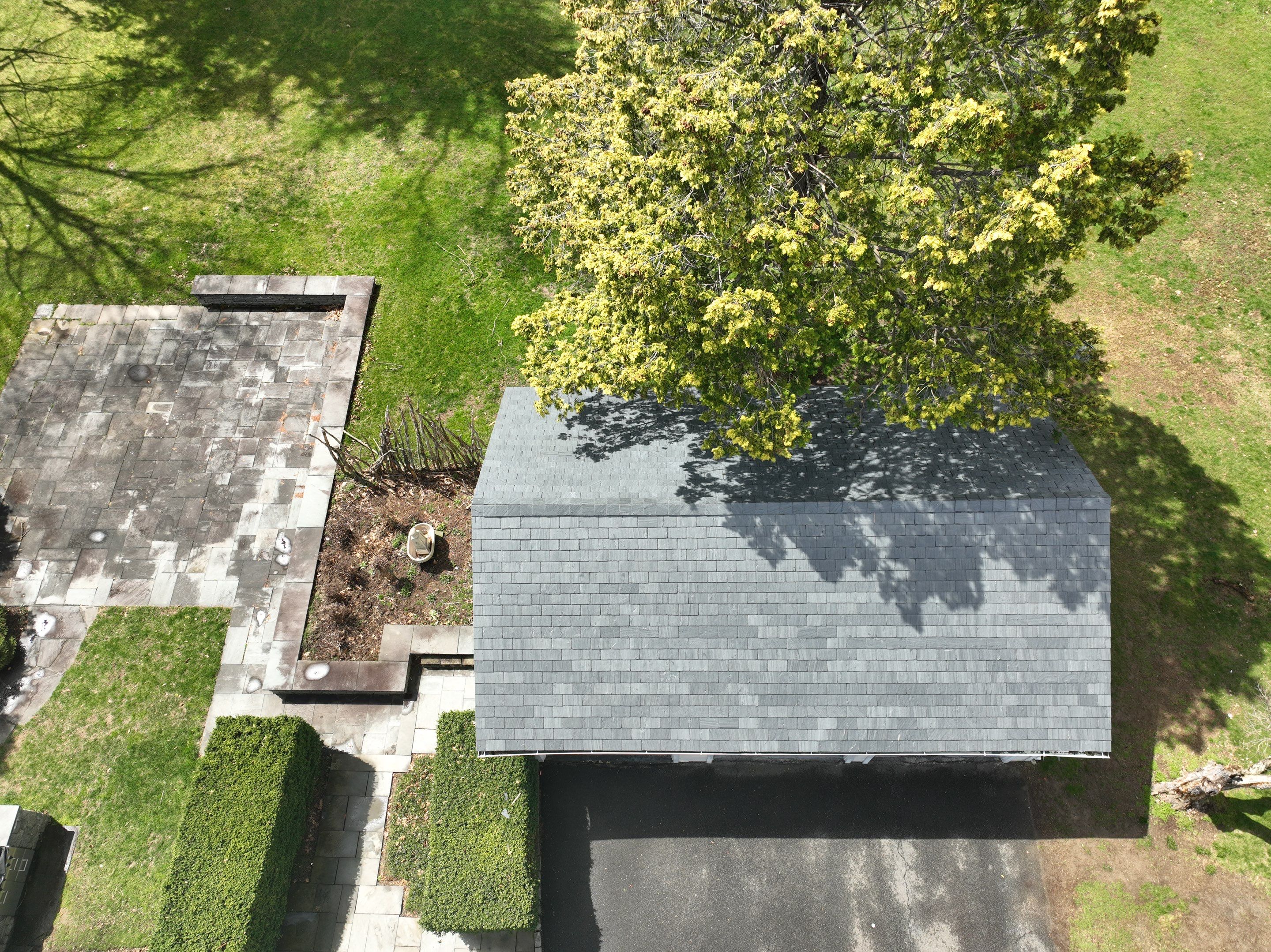 Residential Roofing Installation using Vermont Slate by A Plus Exterior