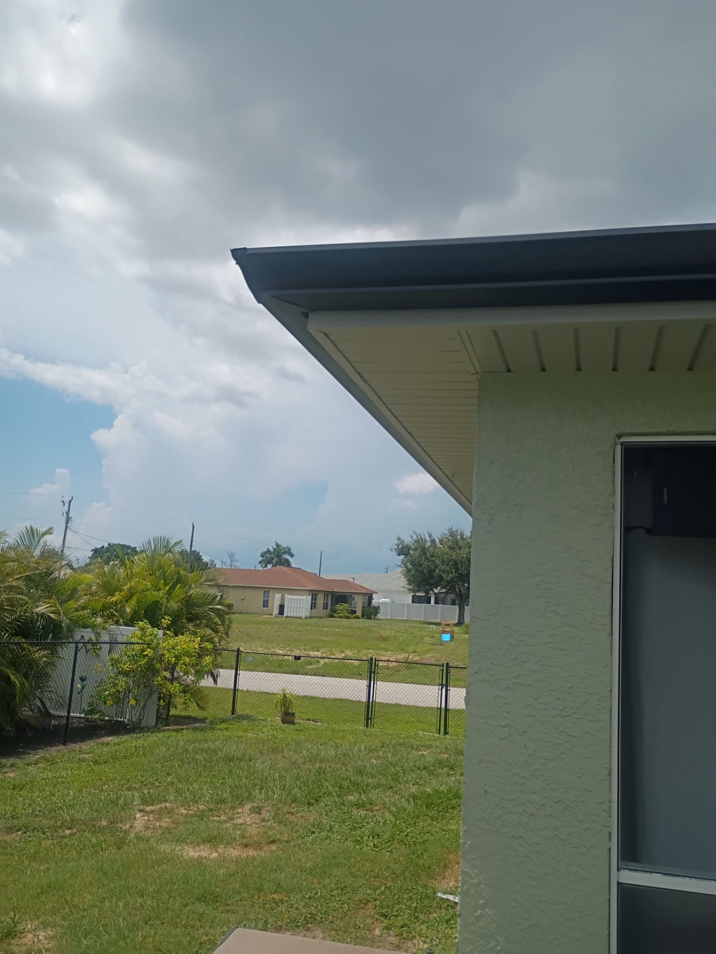 Black Seamless Gutters using K-Style Seamless Gutters in Cape Coral FL by Gutter Professors