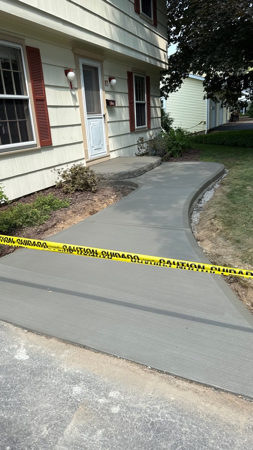 Broom Finish Walkway  by NG Masonry & Construction LLC