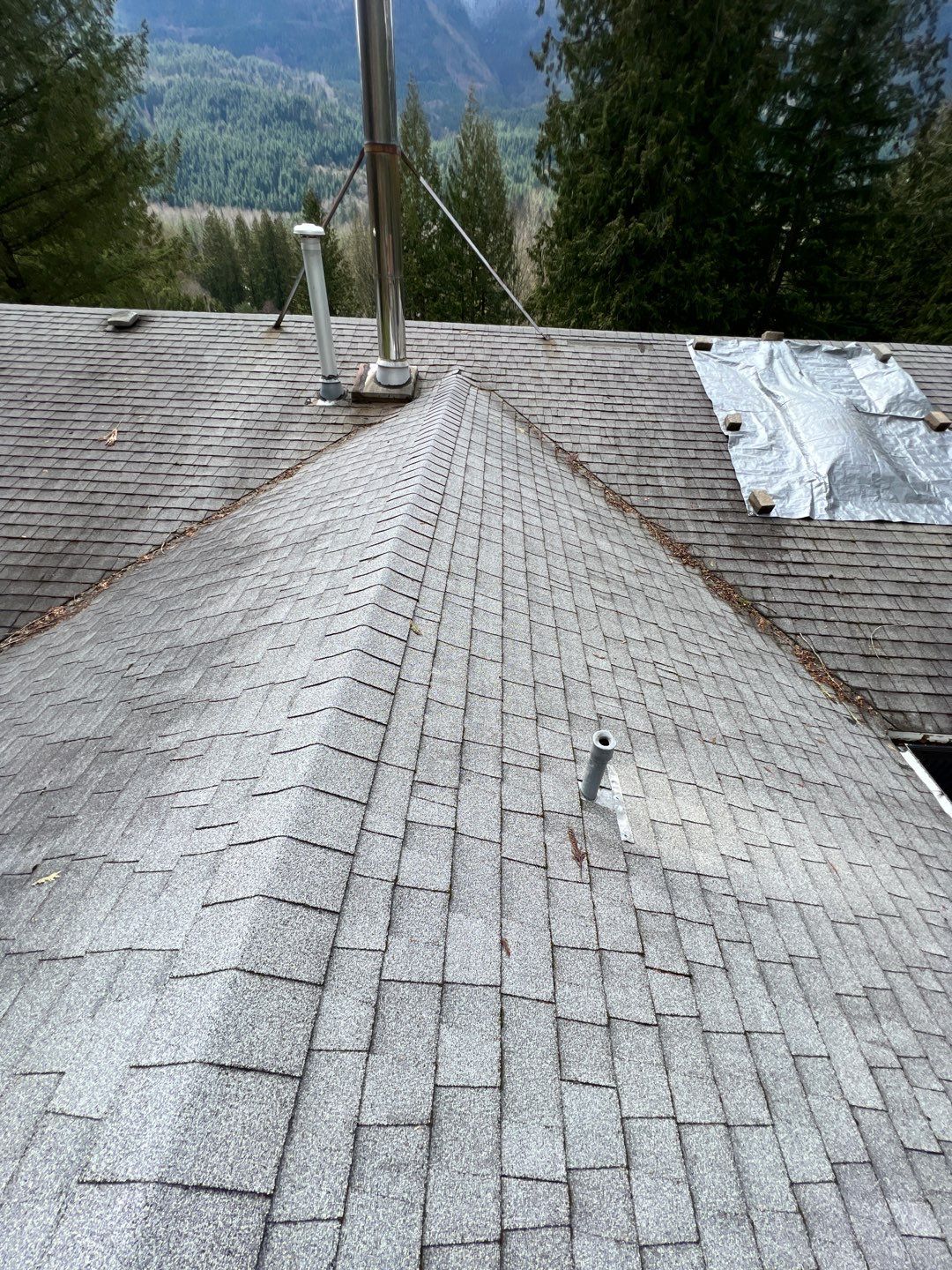 Residential ReRoofing Installation using 12" Prolok metal by Top Notch Roofing Inc