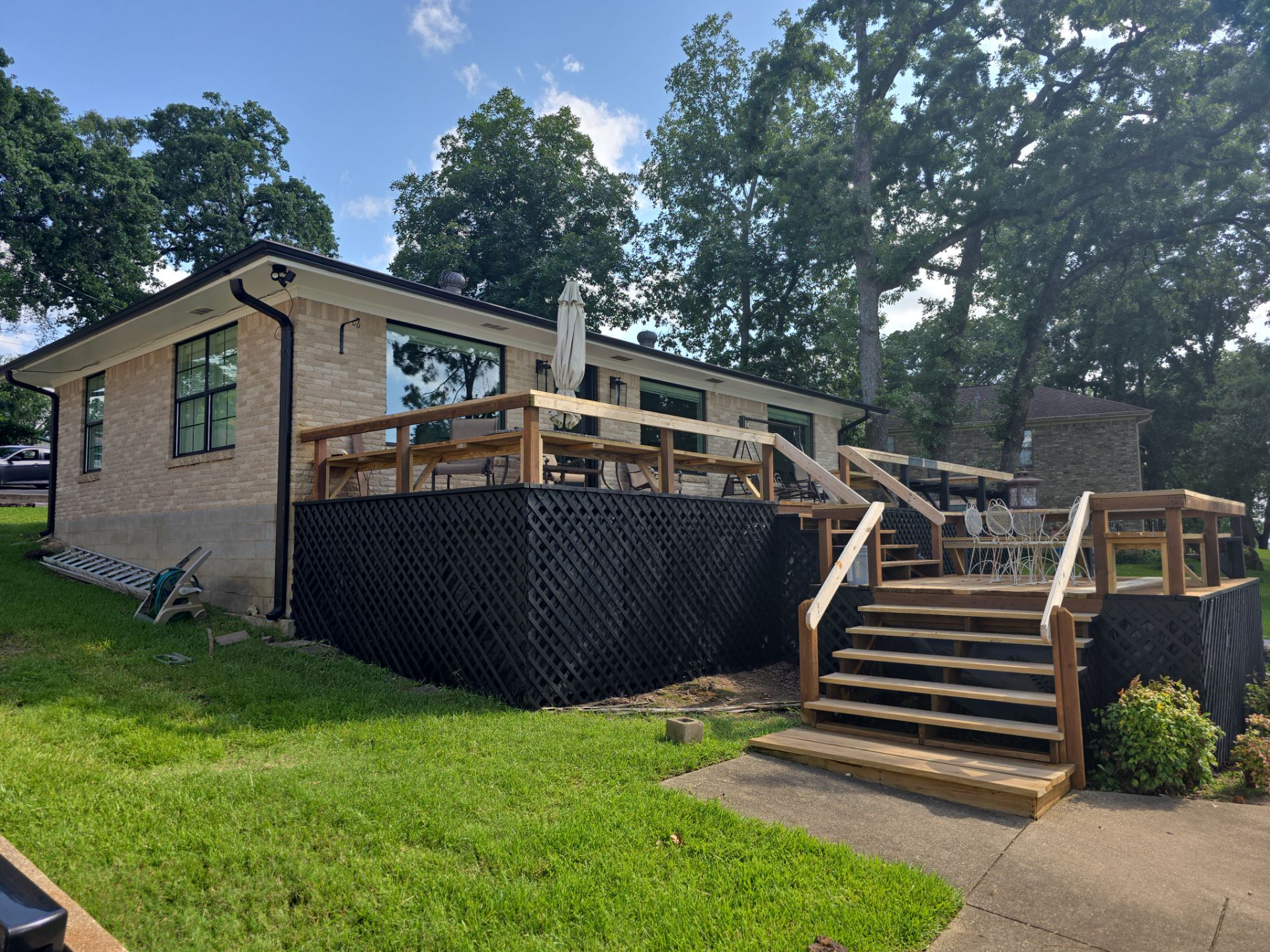 Lake House Deck Restaining in Flint, Texas by Quality Coats Painting