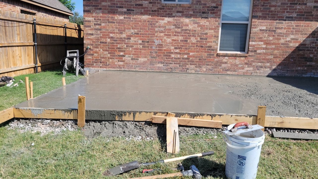 Concrete slab with Pergola by Clays Services Inc