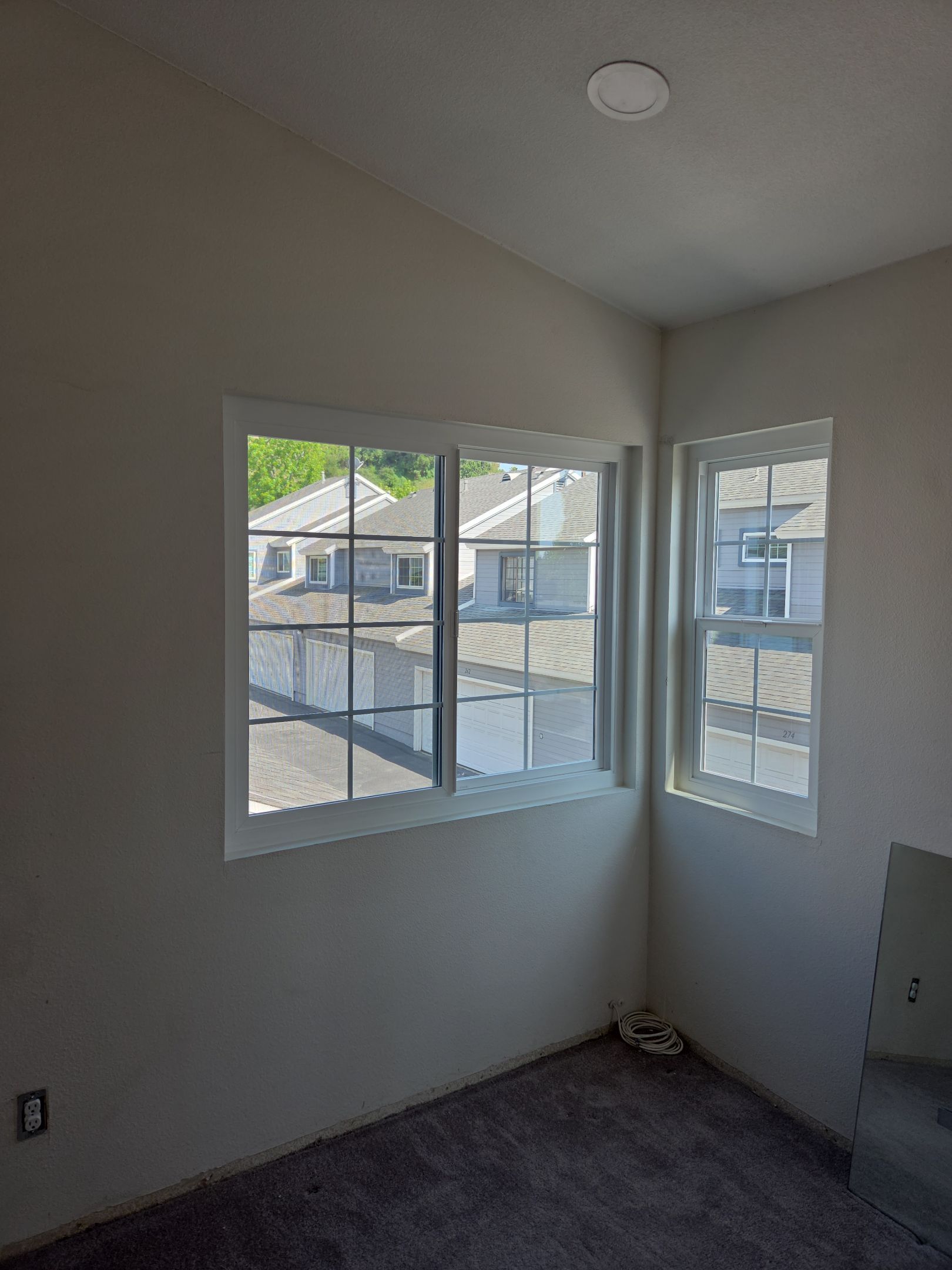 Window Installation using Milgard V300 Trinsic with grids by American Window Company