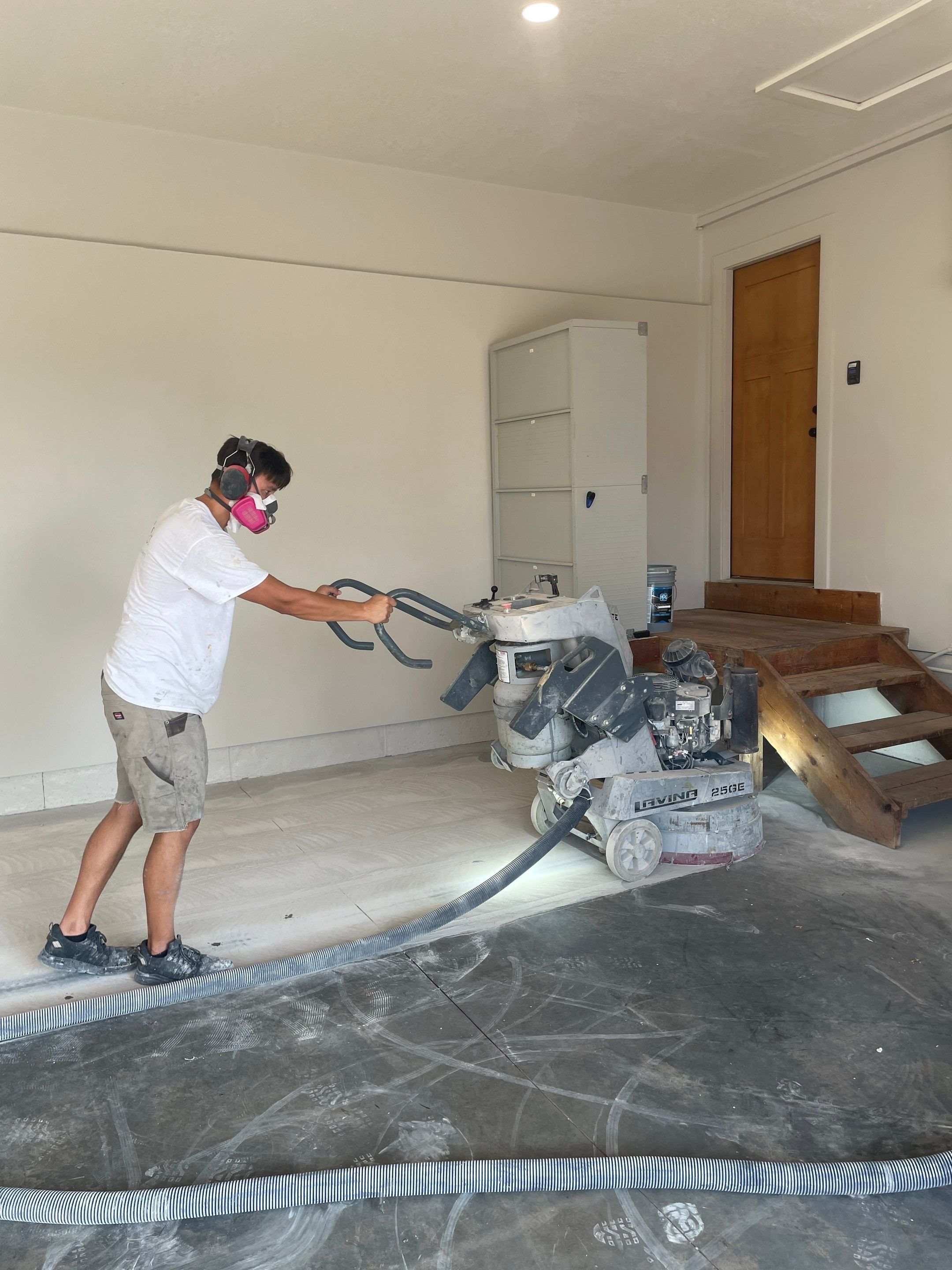 Domino Flake Floor Coating and Crack Repair in Chancellor by Select Painting, Coatings & Garage Cabinets