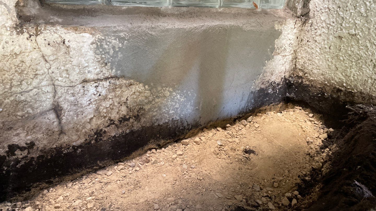 Window Wells & Foundation Grading in South Minneapolis by Waterproofing Northeast